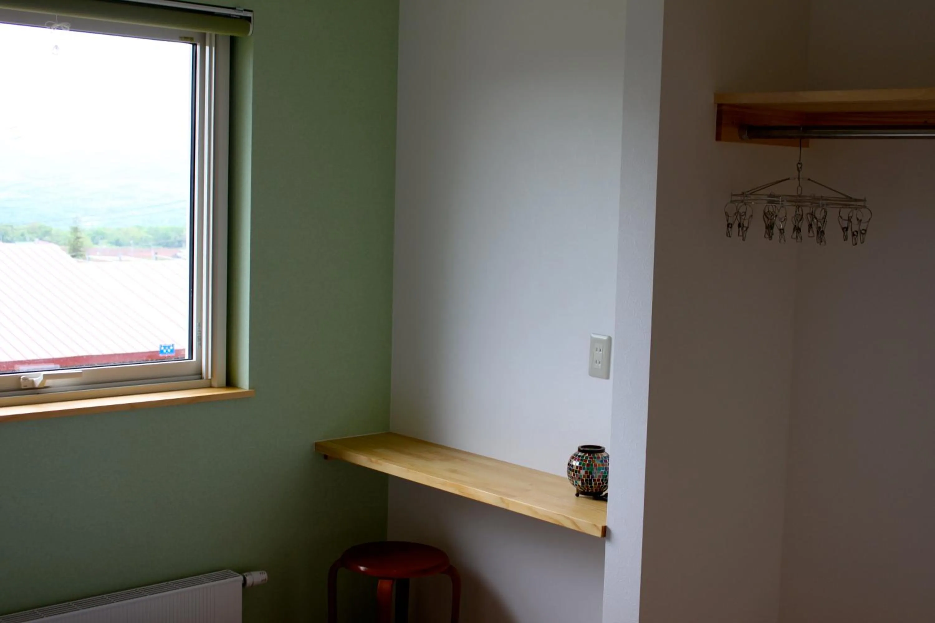 Bed in Niseko Guesthouse Nalu.