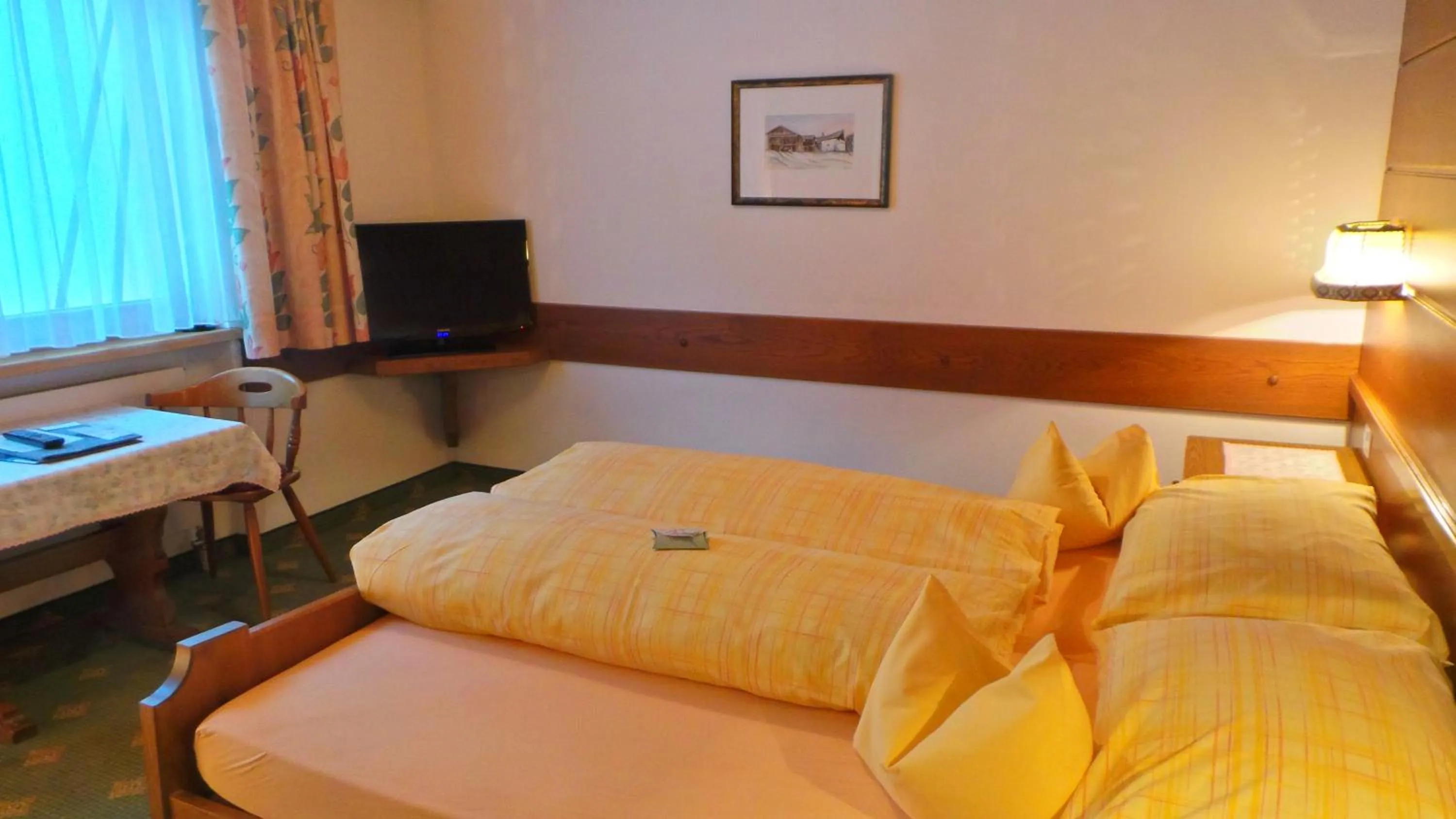 Photo of the whole room, Bed in Sonnenhotel Soldanella Sonneck