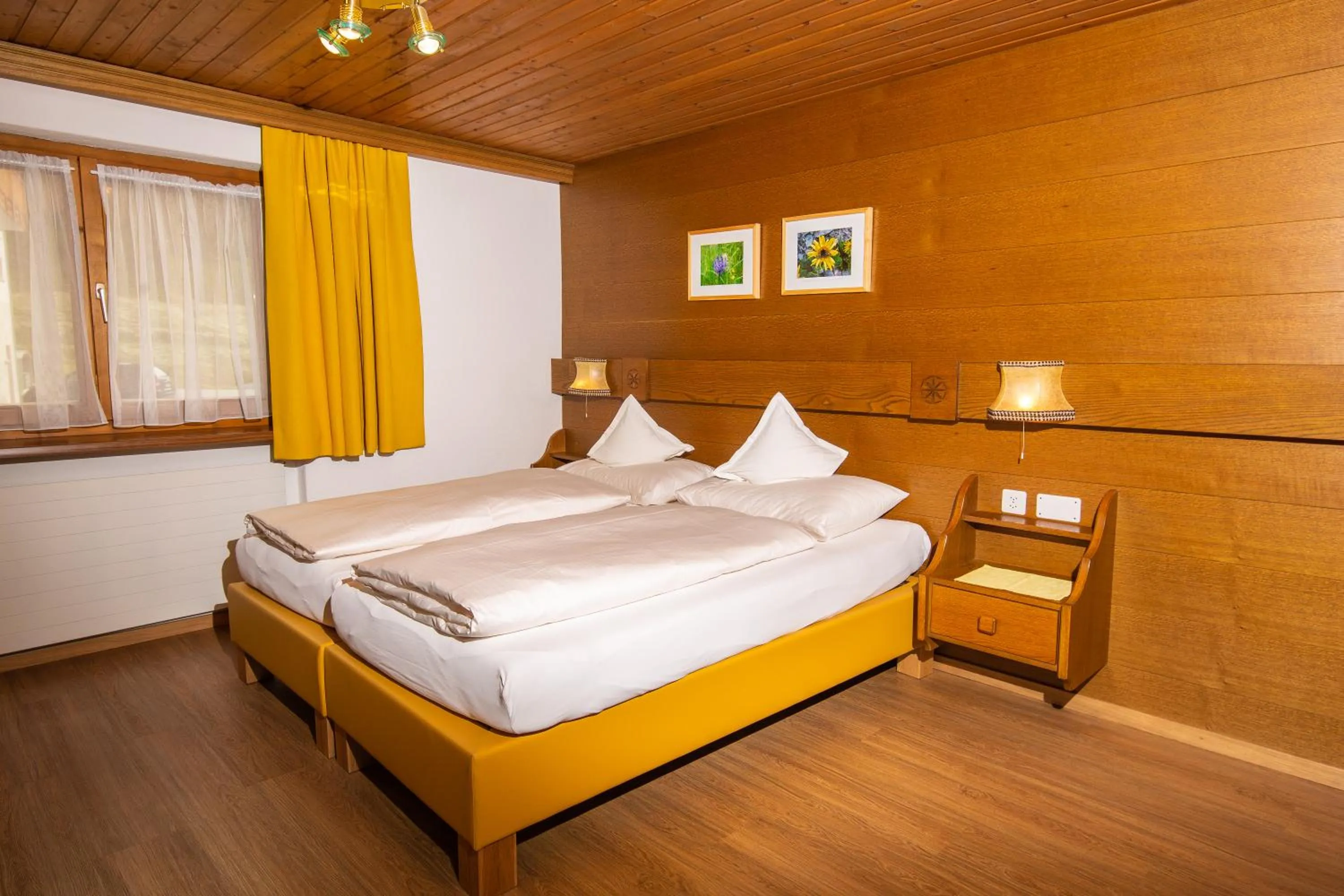 Bed in Sonnenhotel Soldanella Sonneck