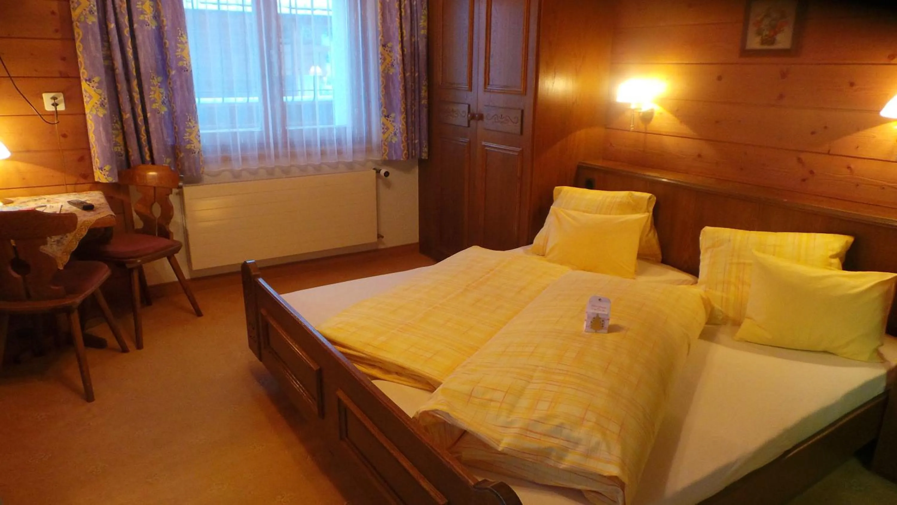 Photo of the whole room, Bed in Sonnenhotel Soldanella Sonneck