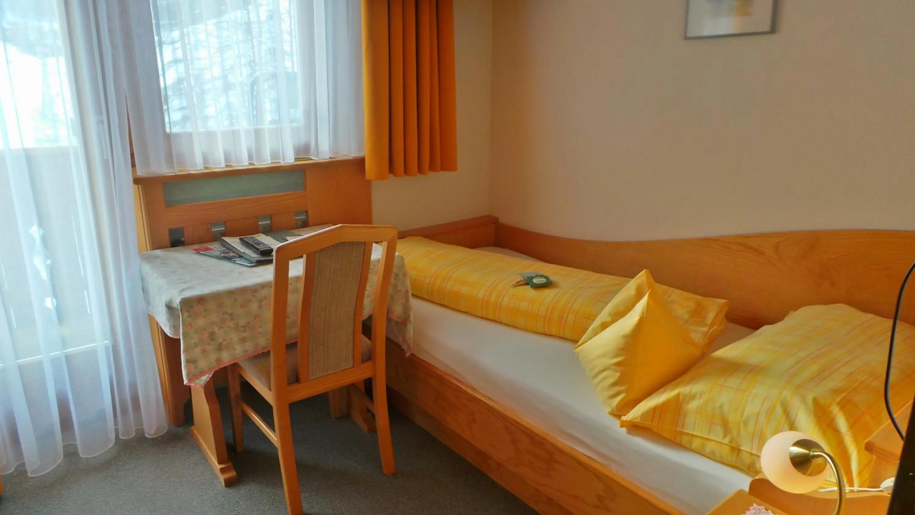 Photo of the whole room, Bed in Sonnenhotel Soldanella Sonneck