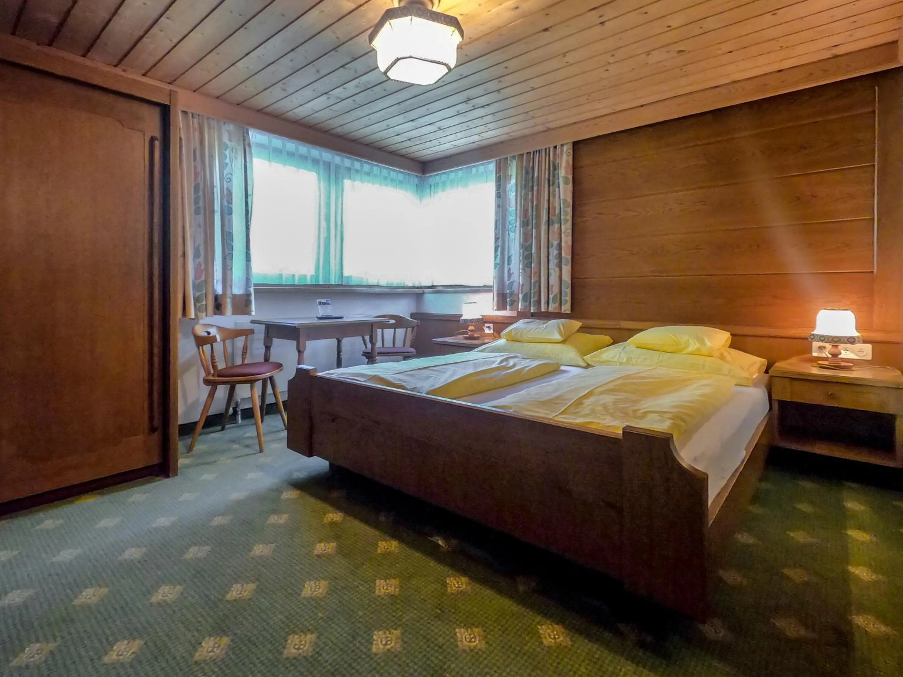 Photo of the whole room, Bed in Sonnenhotel Soldanella Sonneck