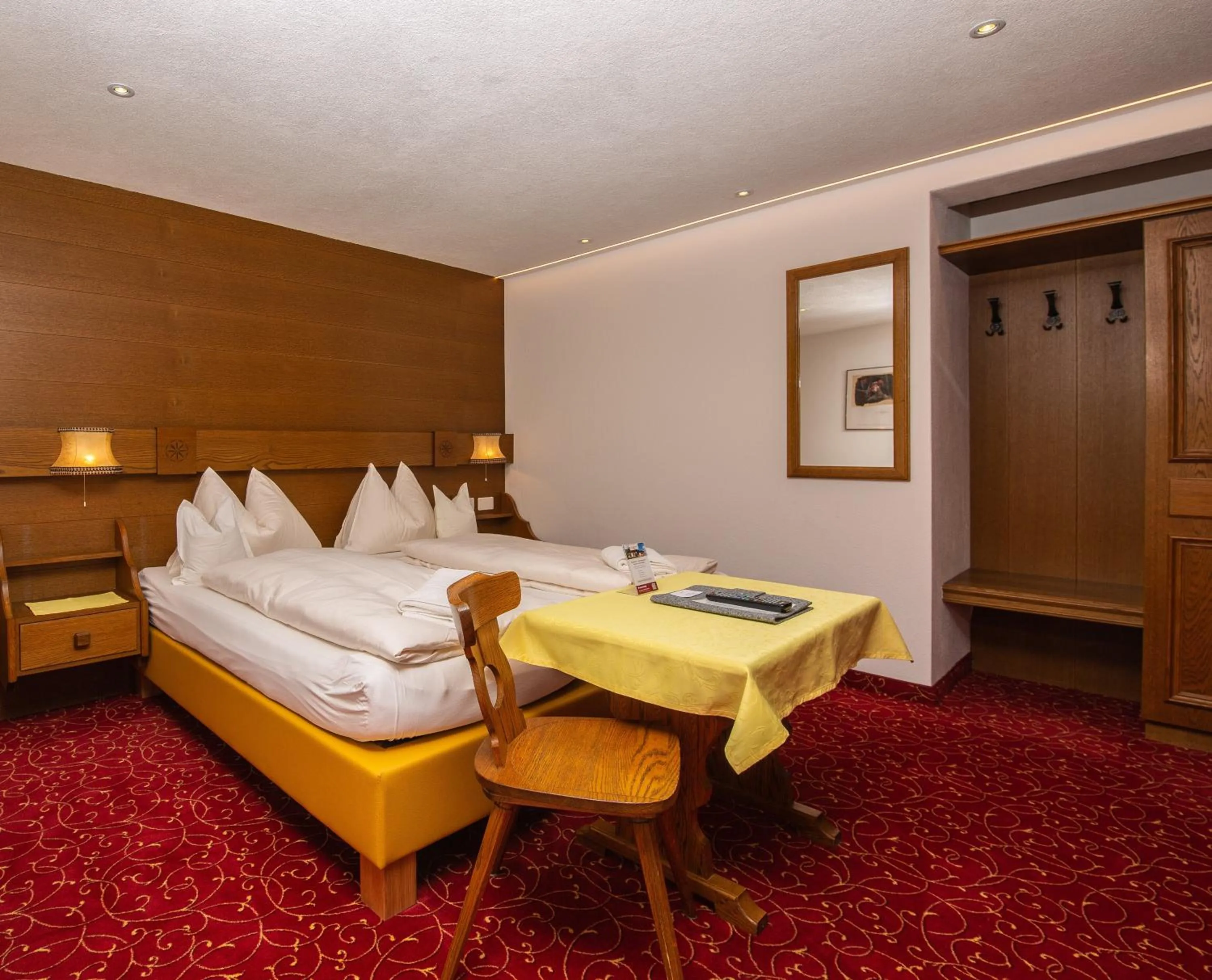 Photo of the whole room, Bed in Sonnenhotel Soldanella Sonneck