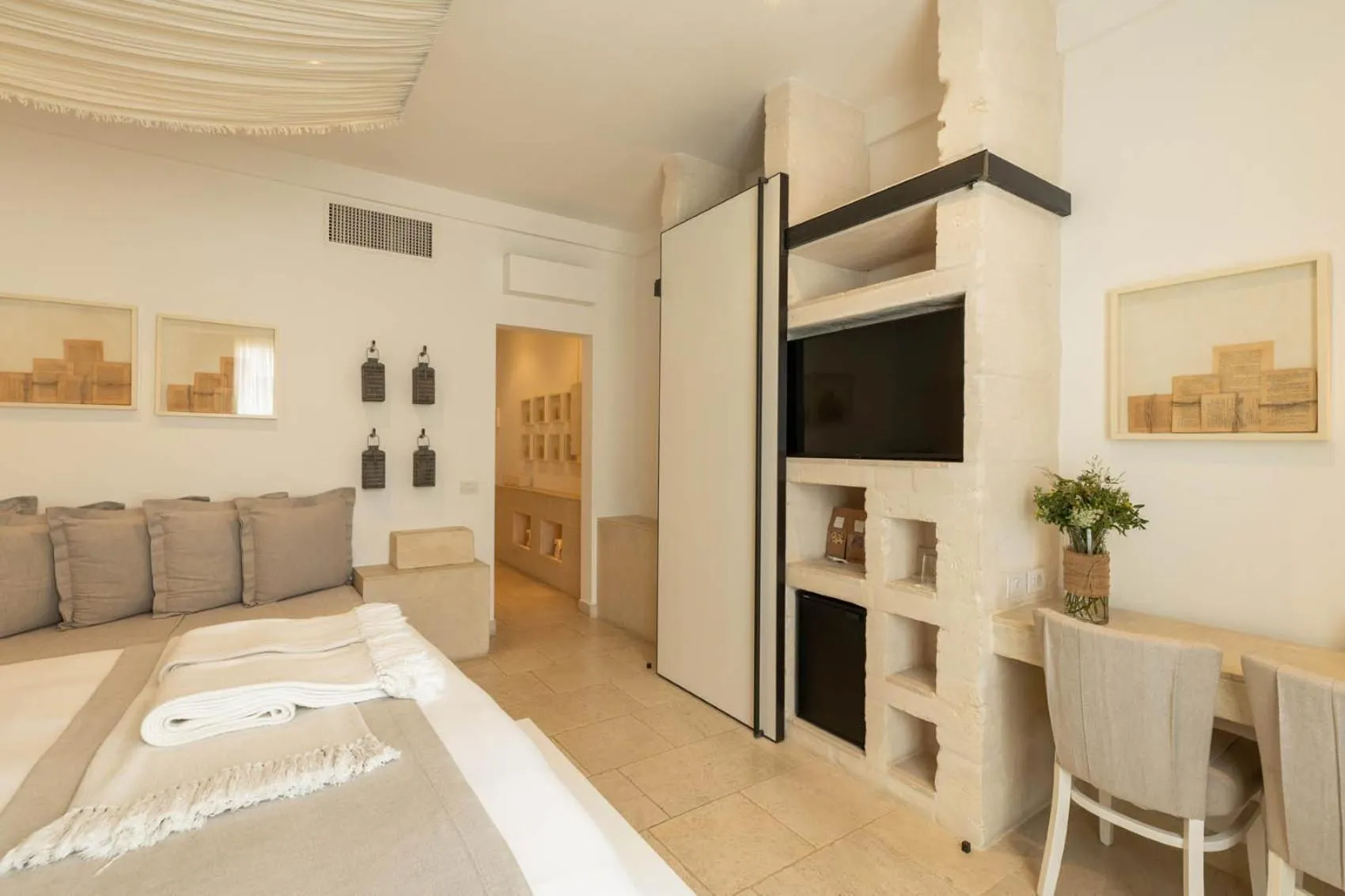 Living room, Bed in Borgo Egnazia