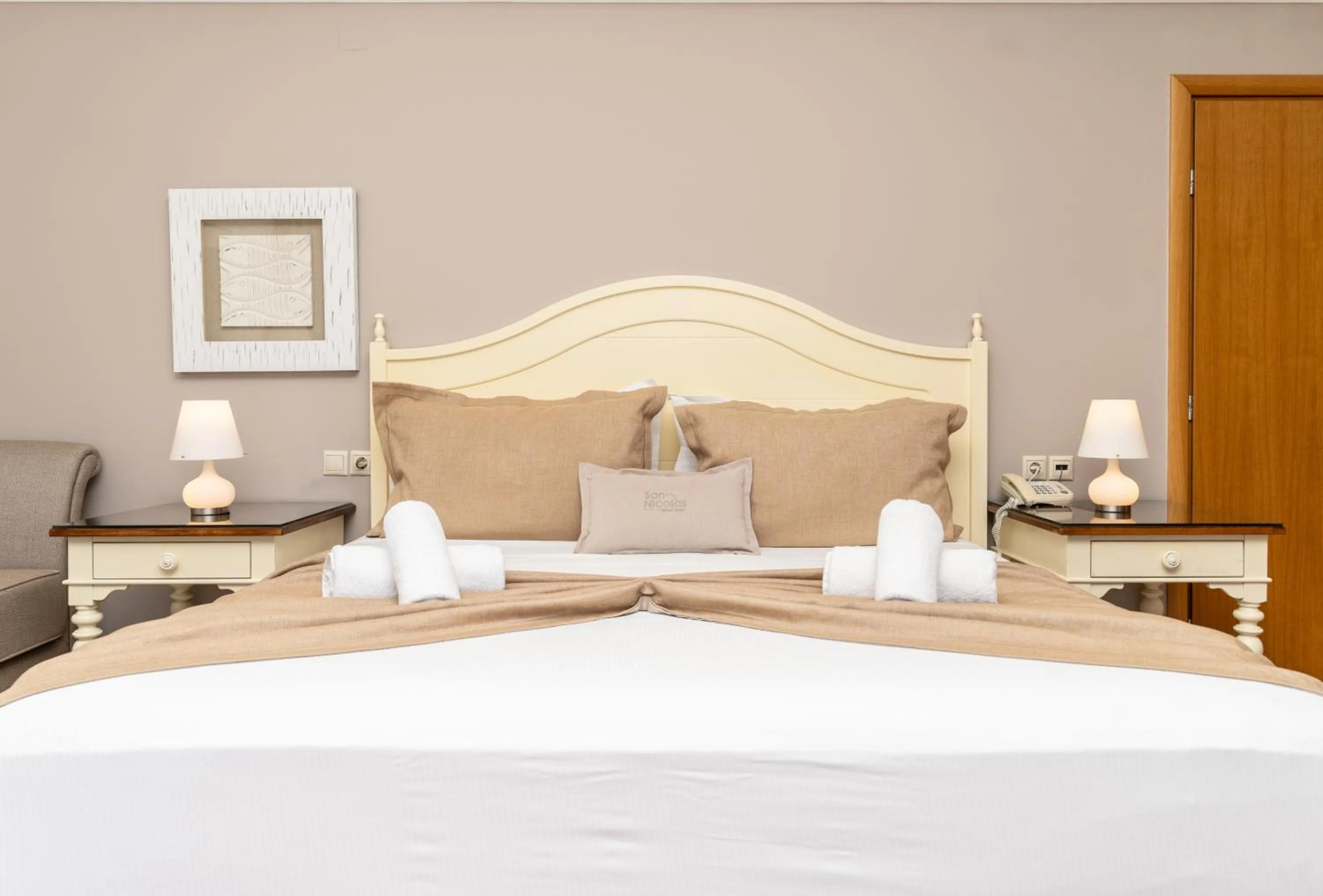 Bed in San Nicolas Resort Hotel