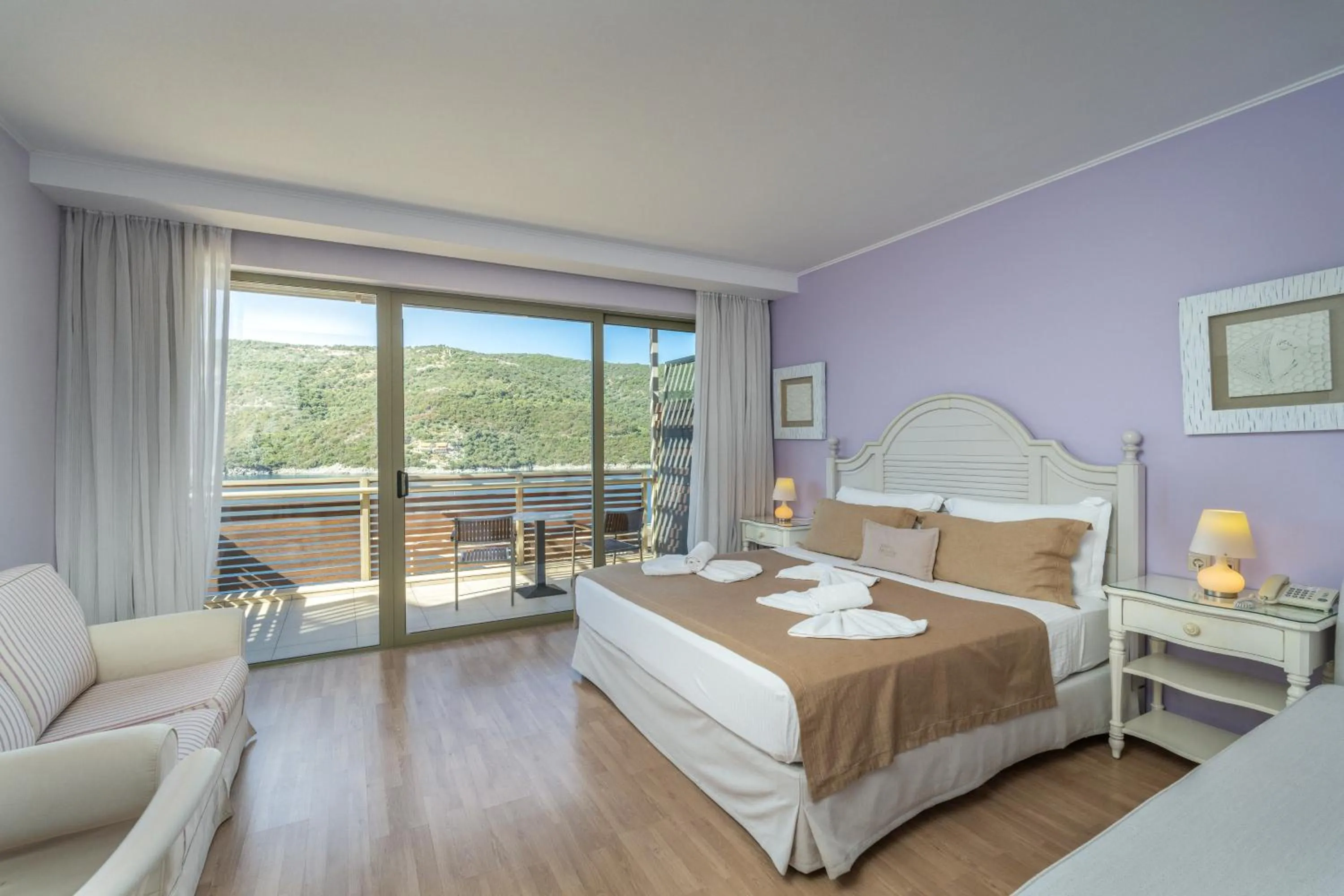 Bed in San Nicolas Resort Hotel