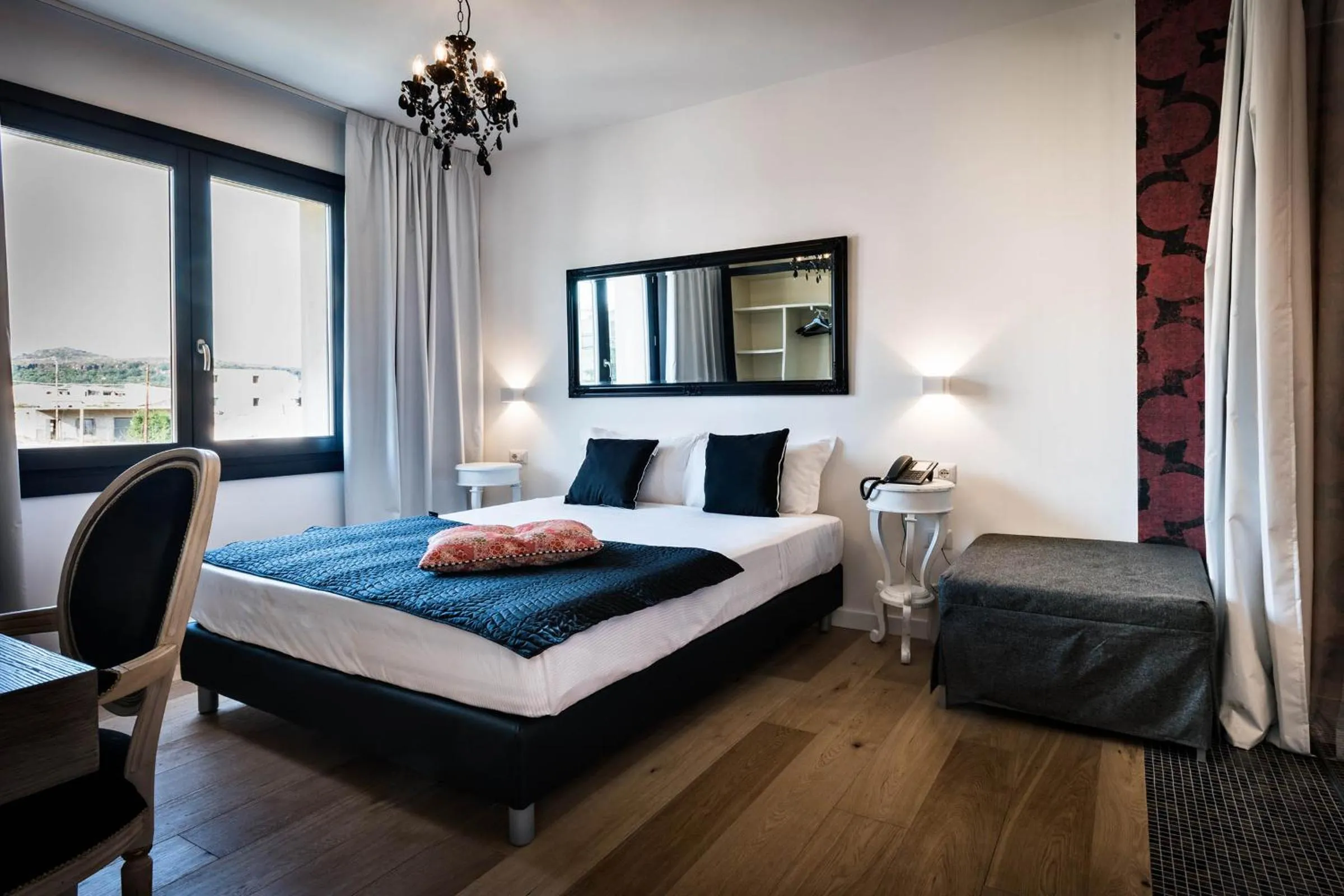 Bedroom in Teku Sardinia Boutique Hotel