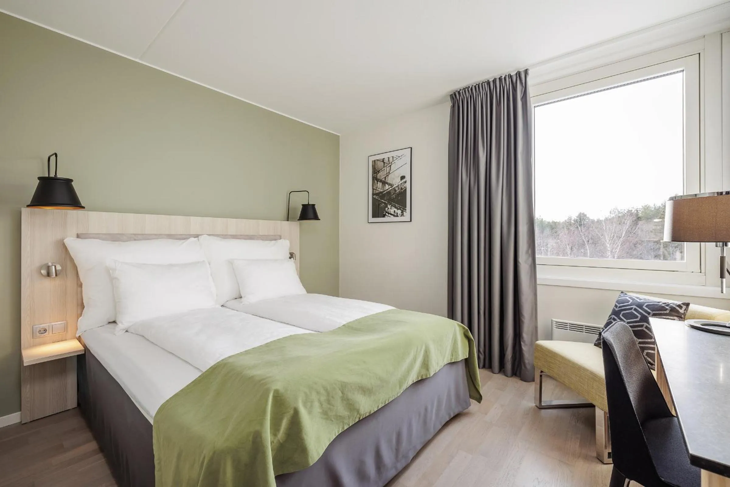 Bed in Quality Hotel Entry