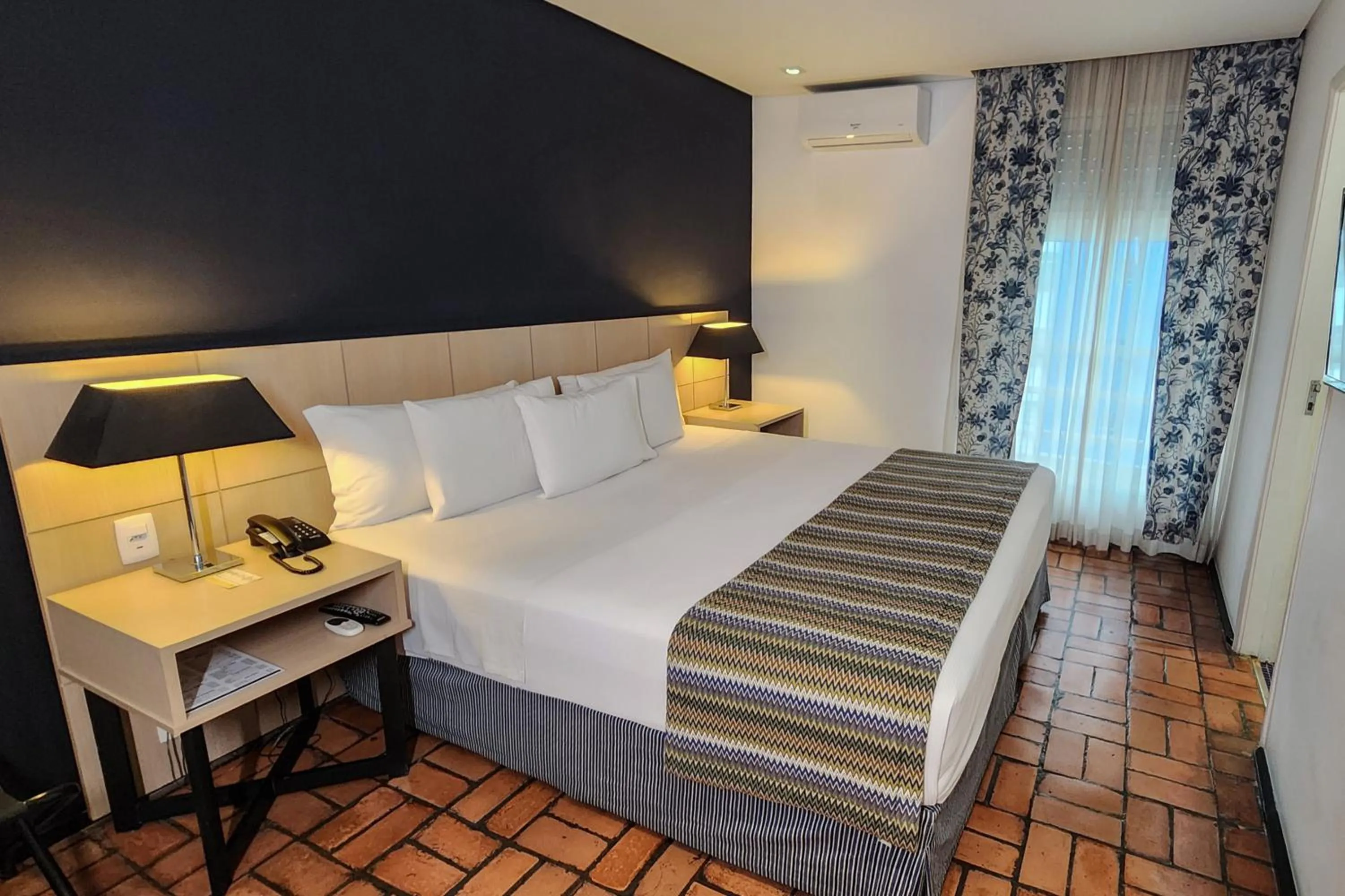 Photo of the whole room, Bed in Ferraretto Guarujá Hotel & Spa