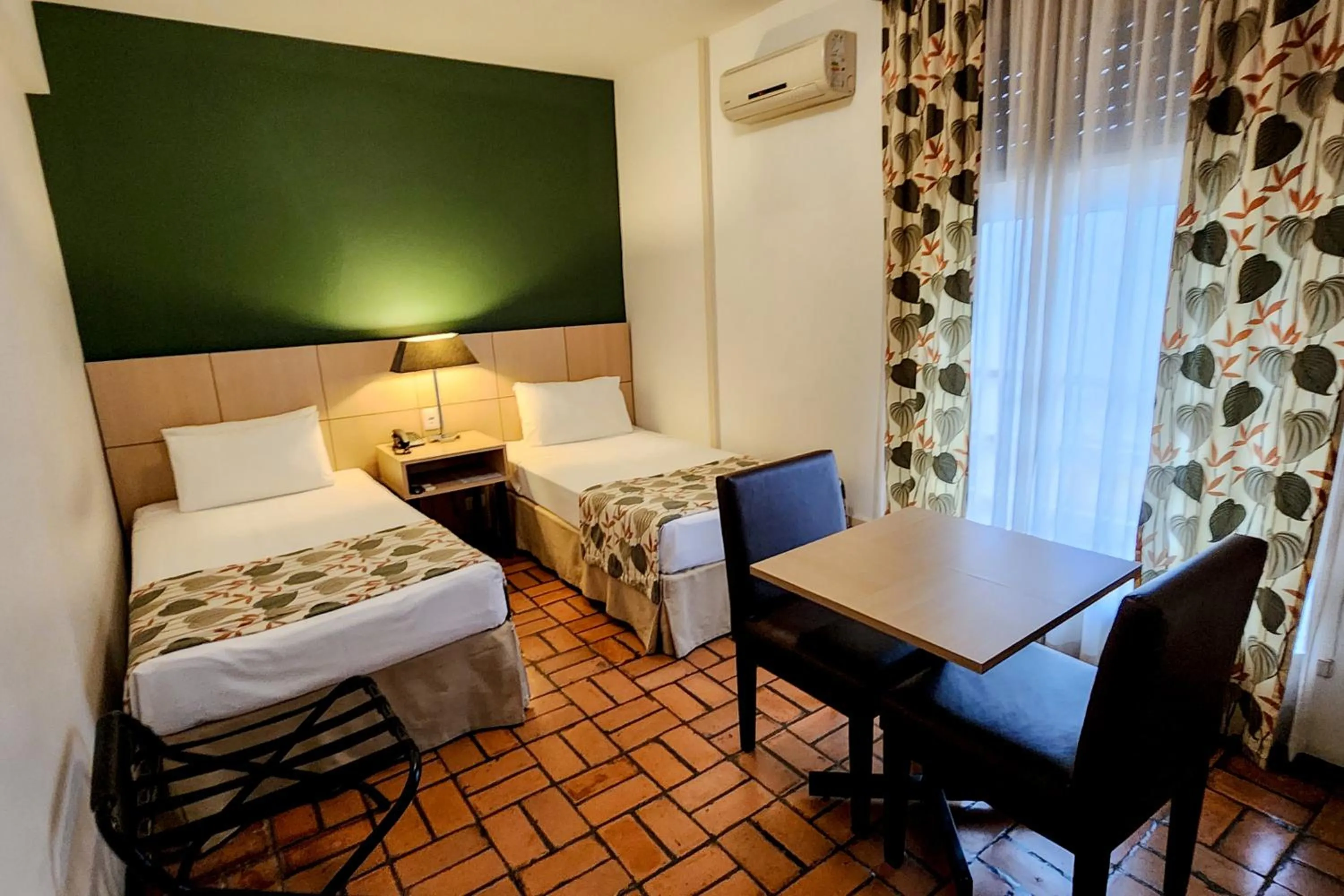 Bed in Ferraretto Guarujá Hotel & Spa