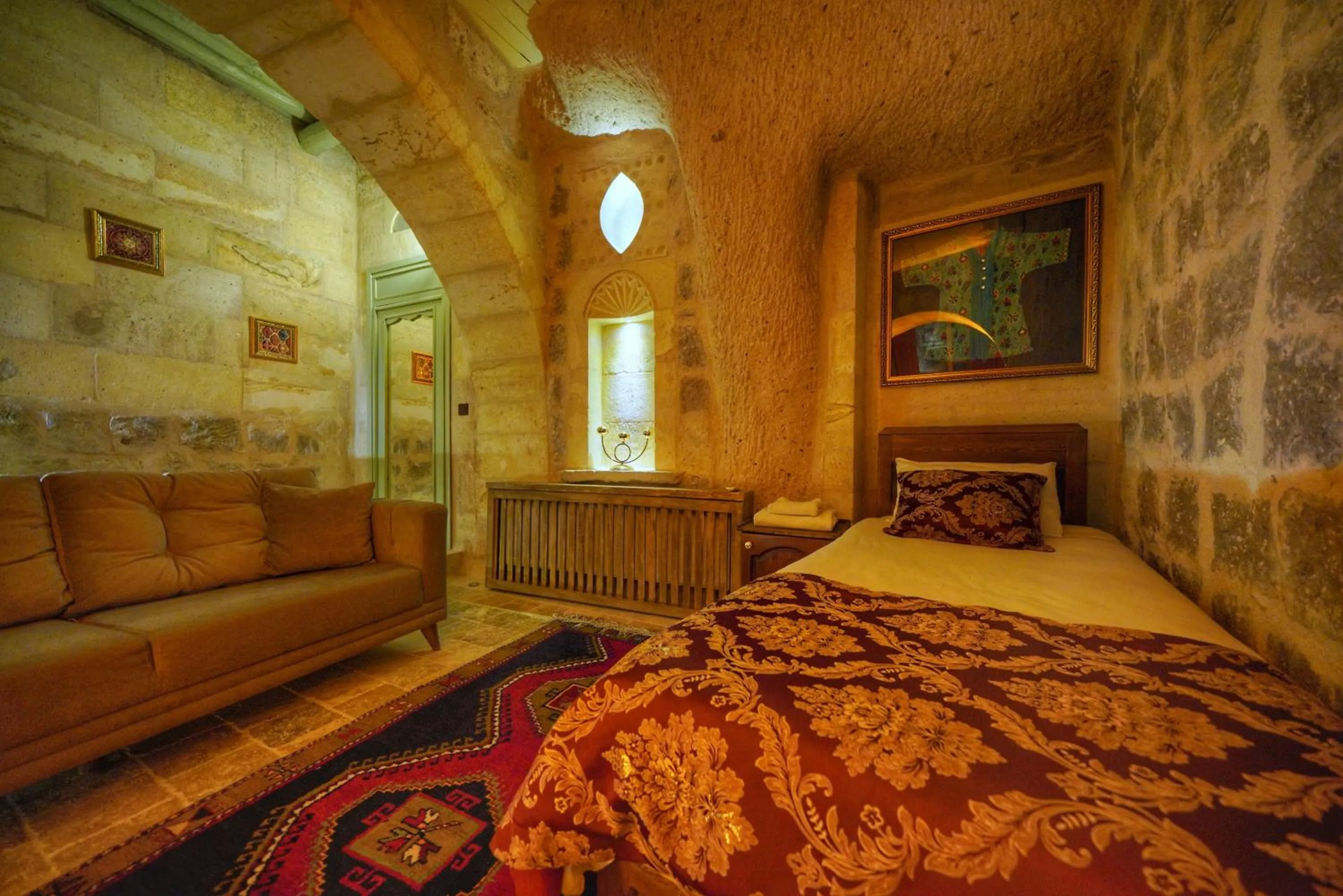 Bed in Takaev Cave House