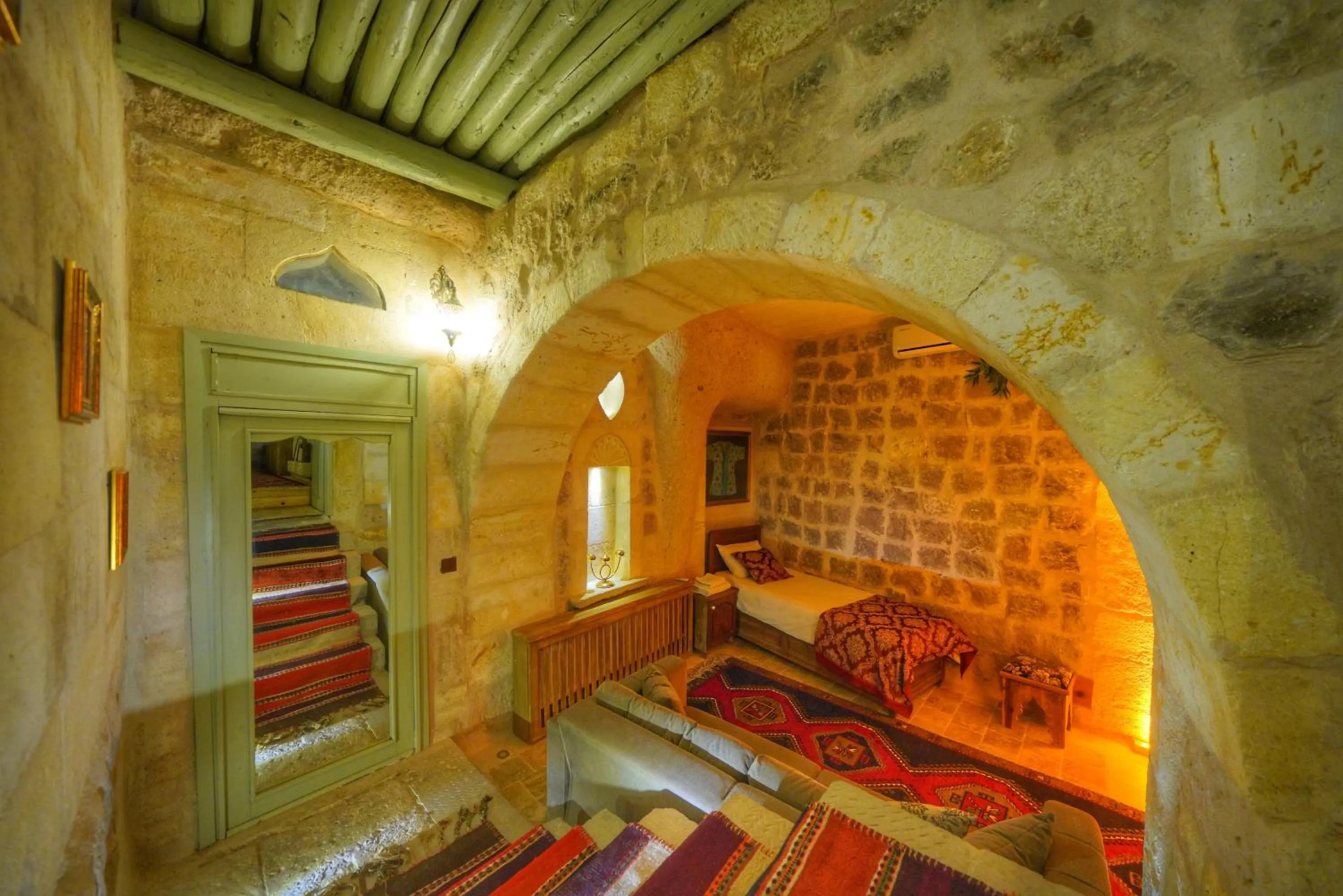 Bed in Takaev Cave House