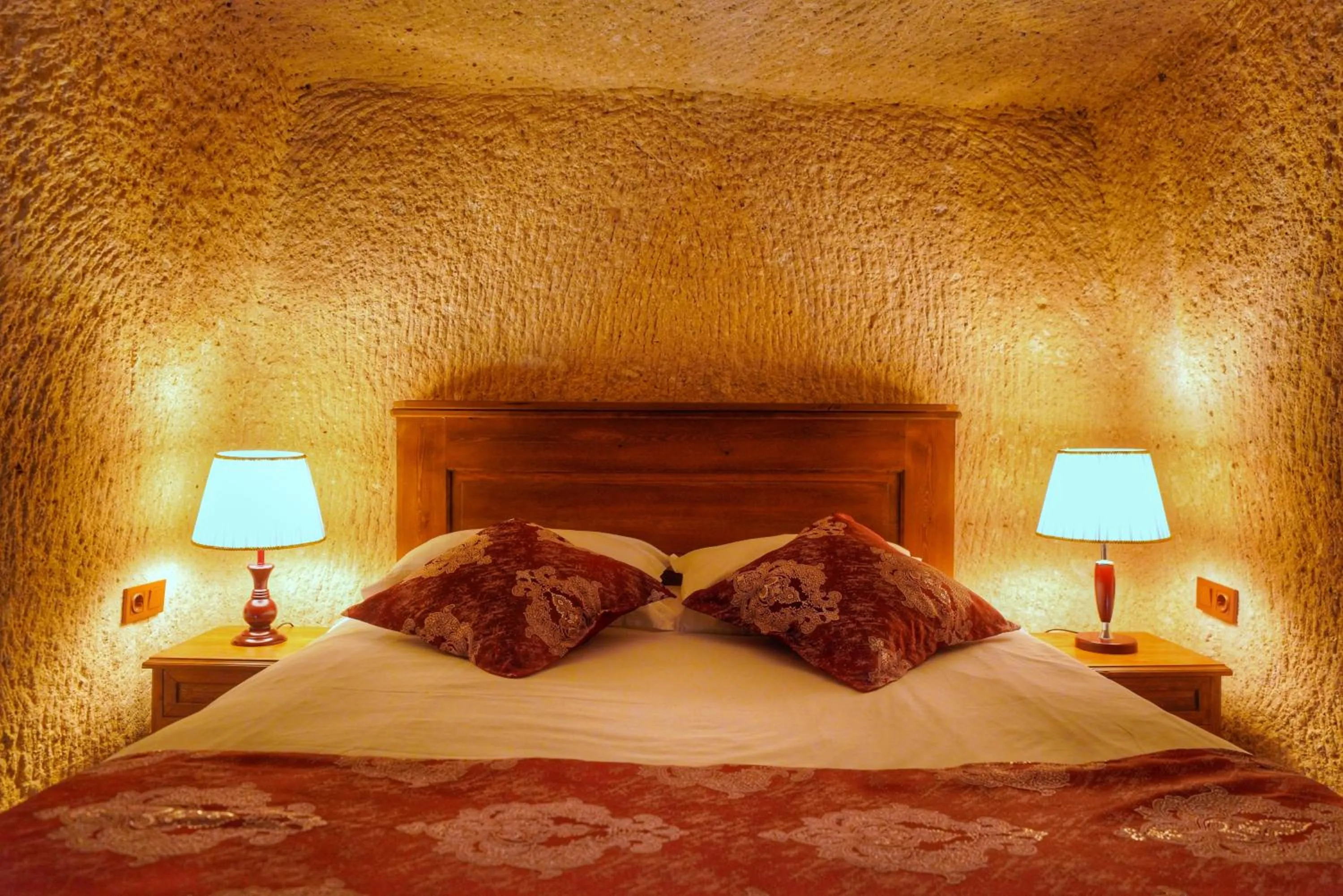 Bed in Takaev Cave House