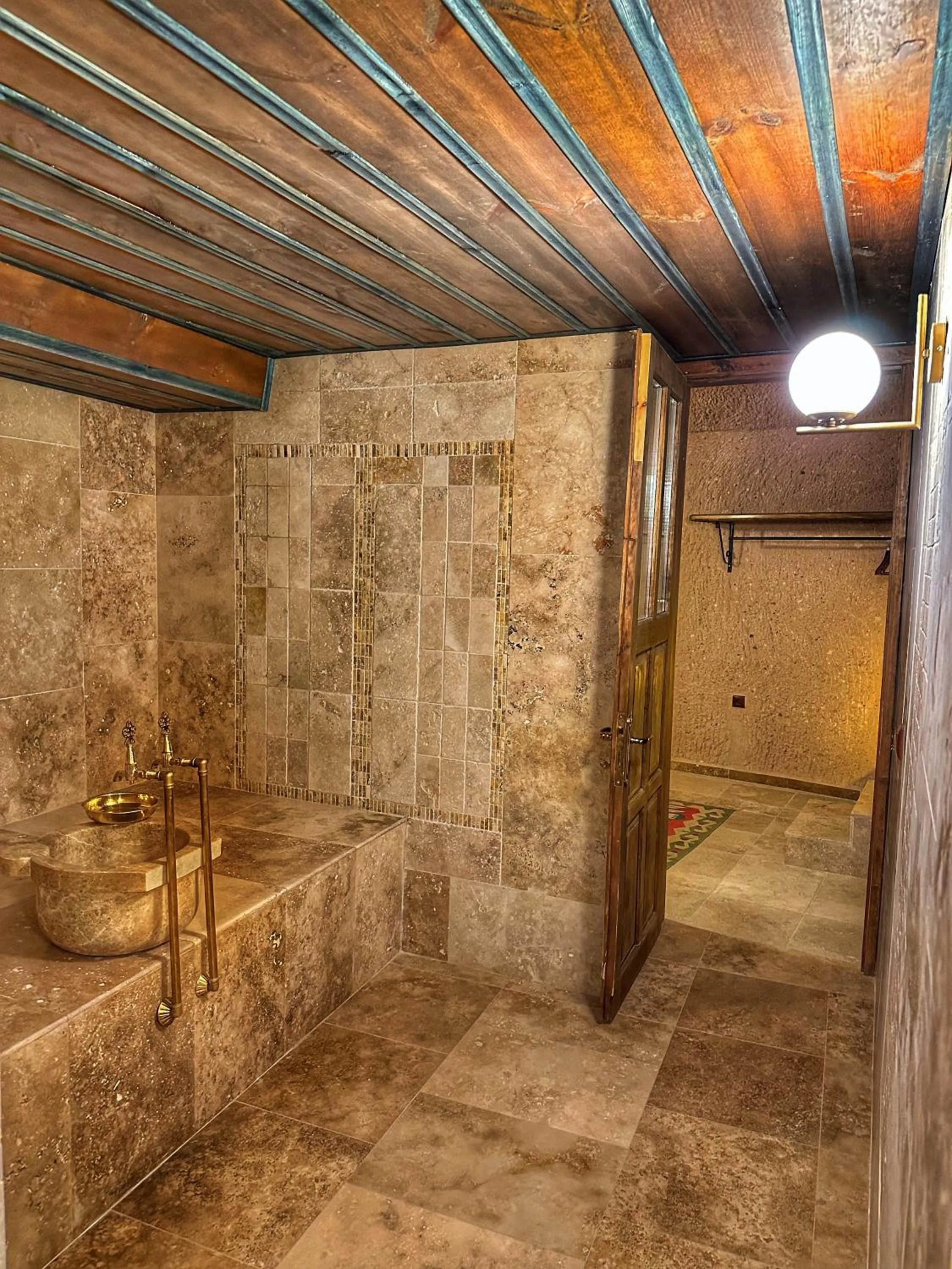 Shower in Takaev Cave House