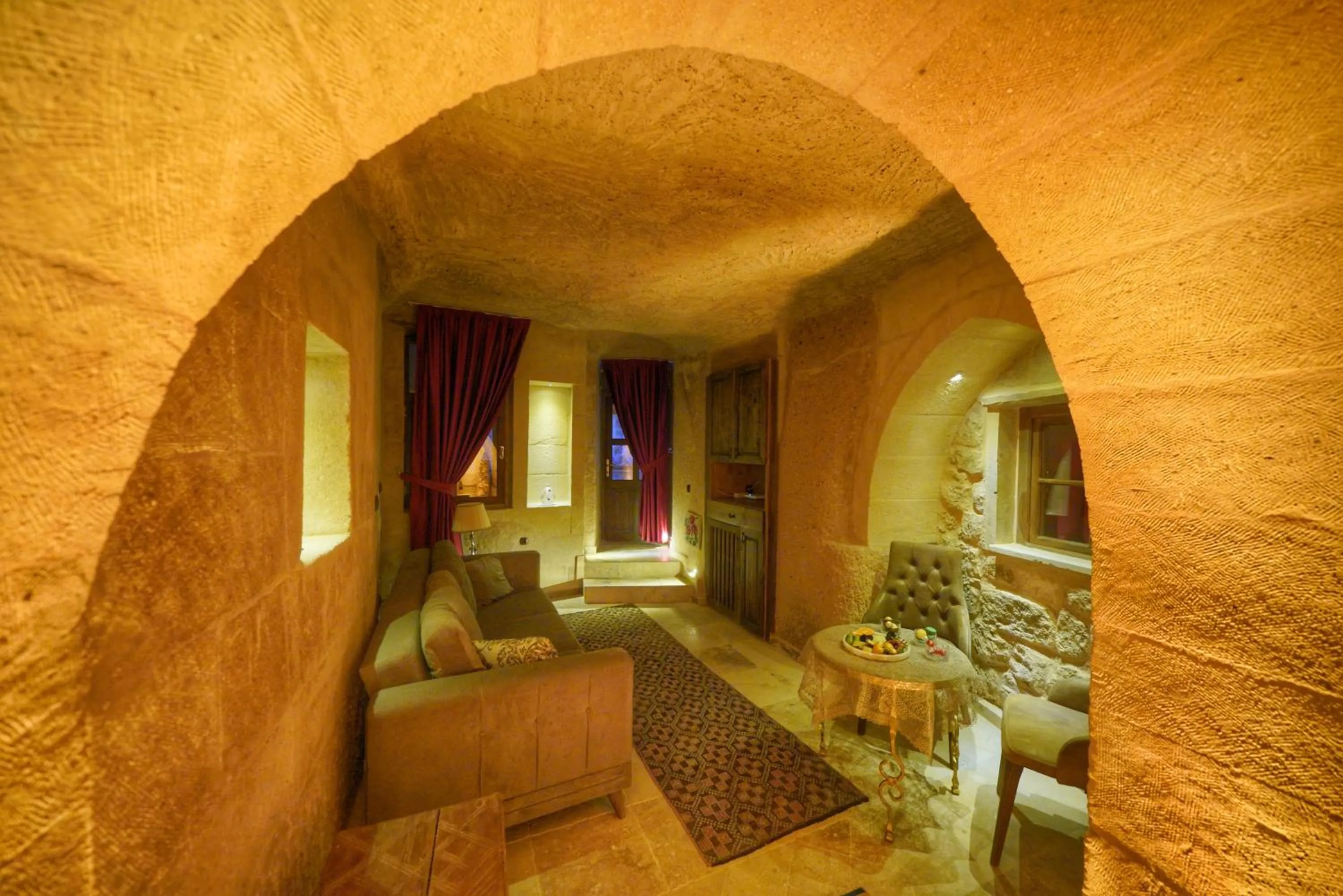 Living room in Takaev Cave House