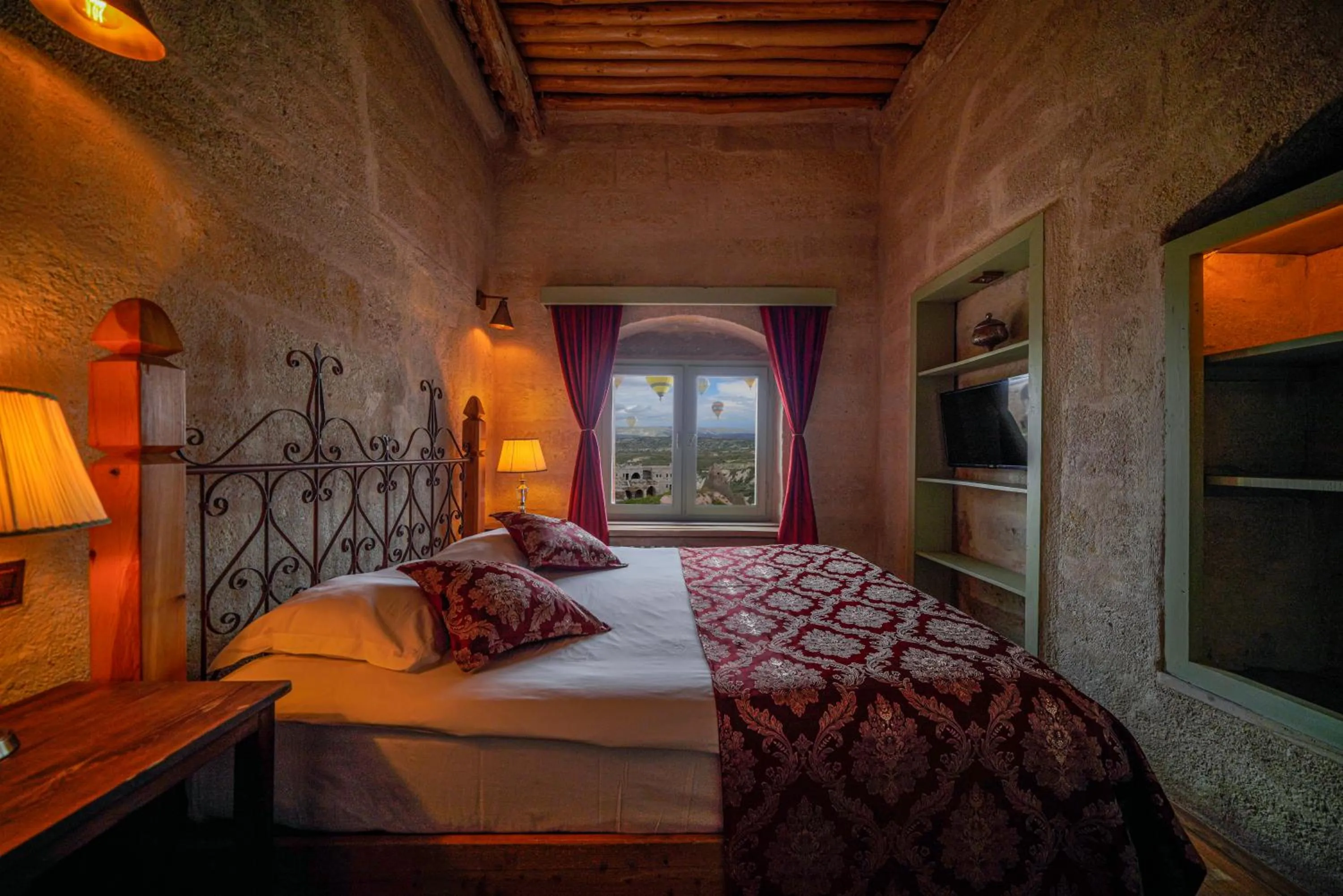 Photo of the whole room, Bed in Takaev Cave House