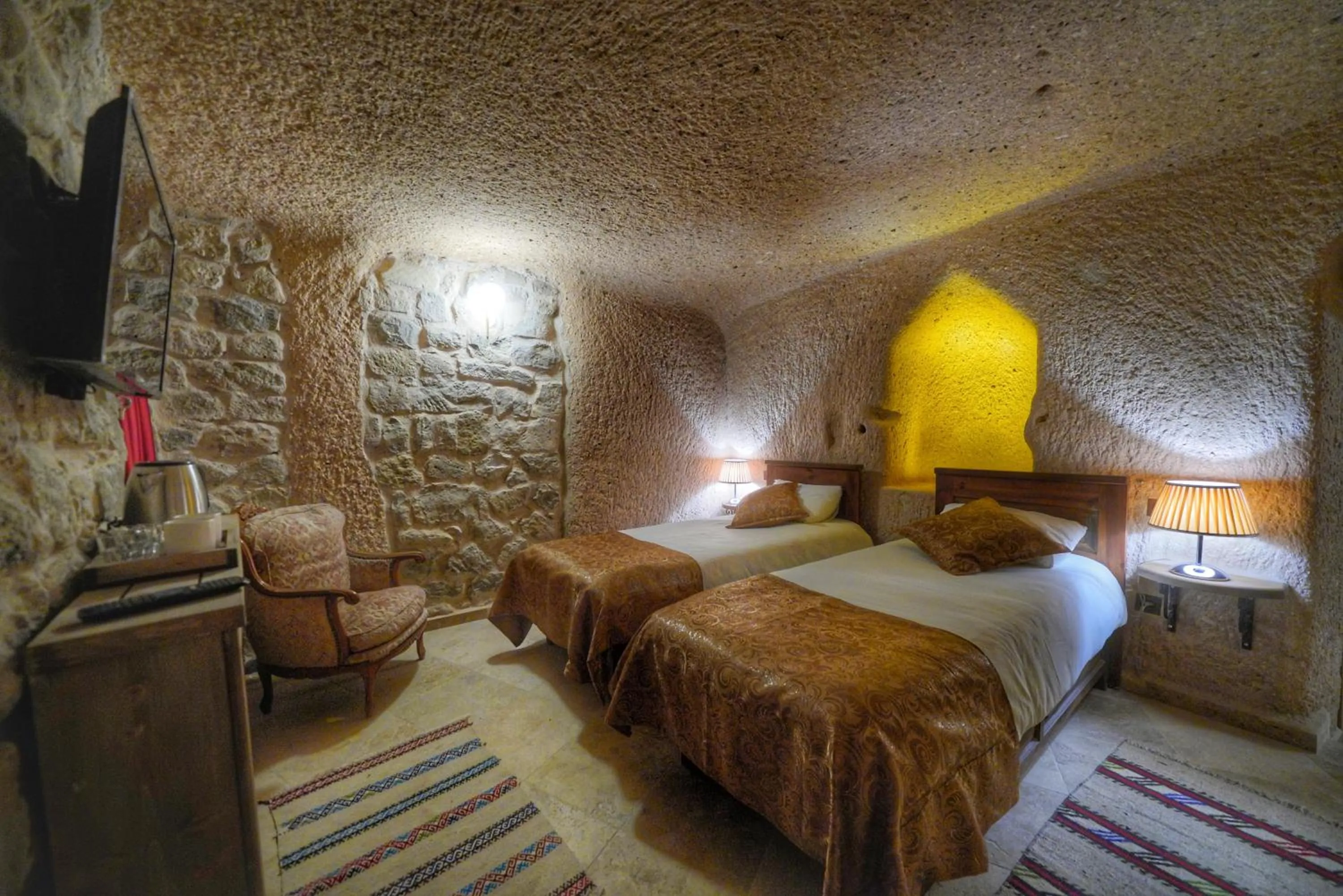 Bed in Takaev Cave House