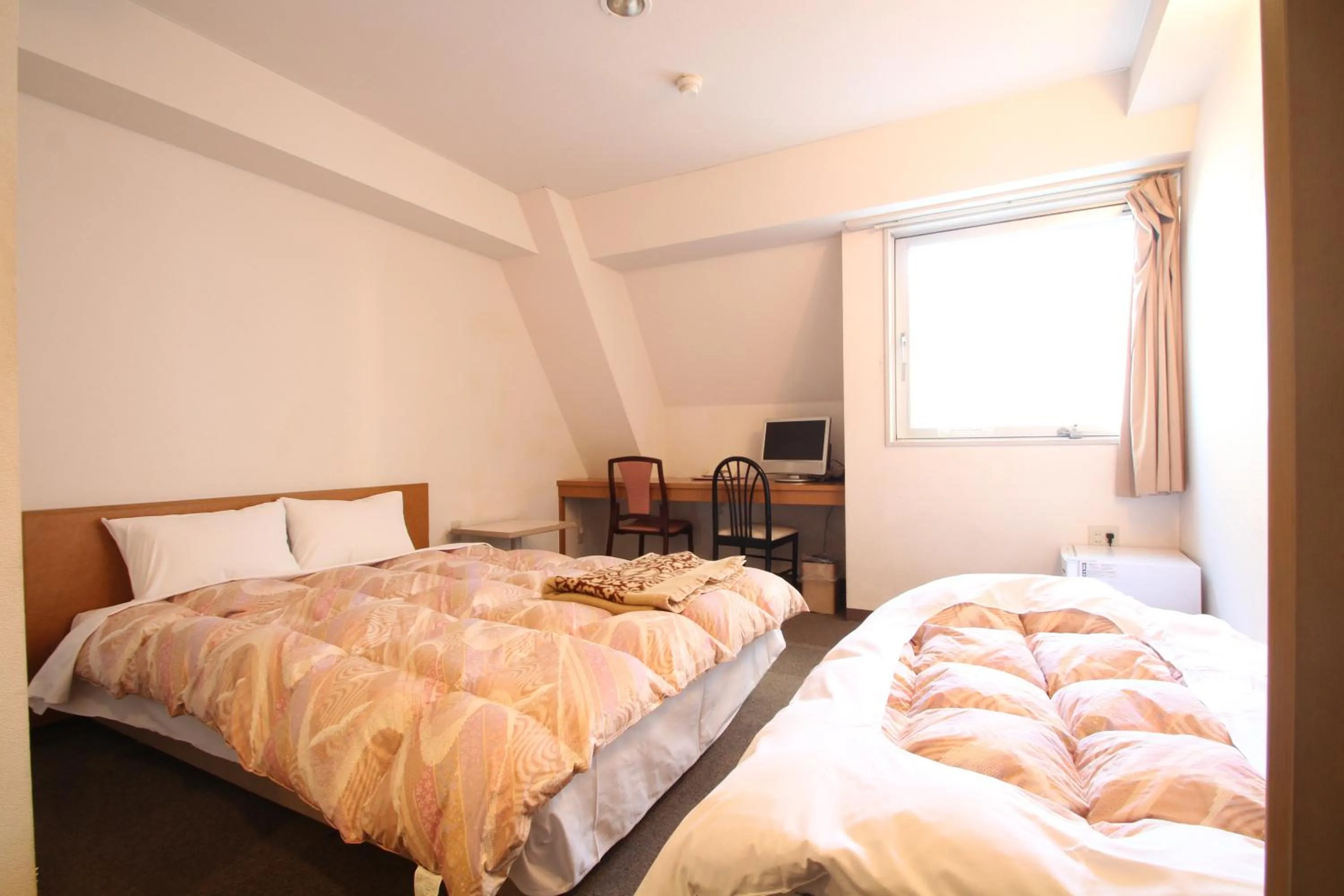 Photo of the whole room, Bed in Sakura Hotel Ikebukuro