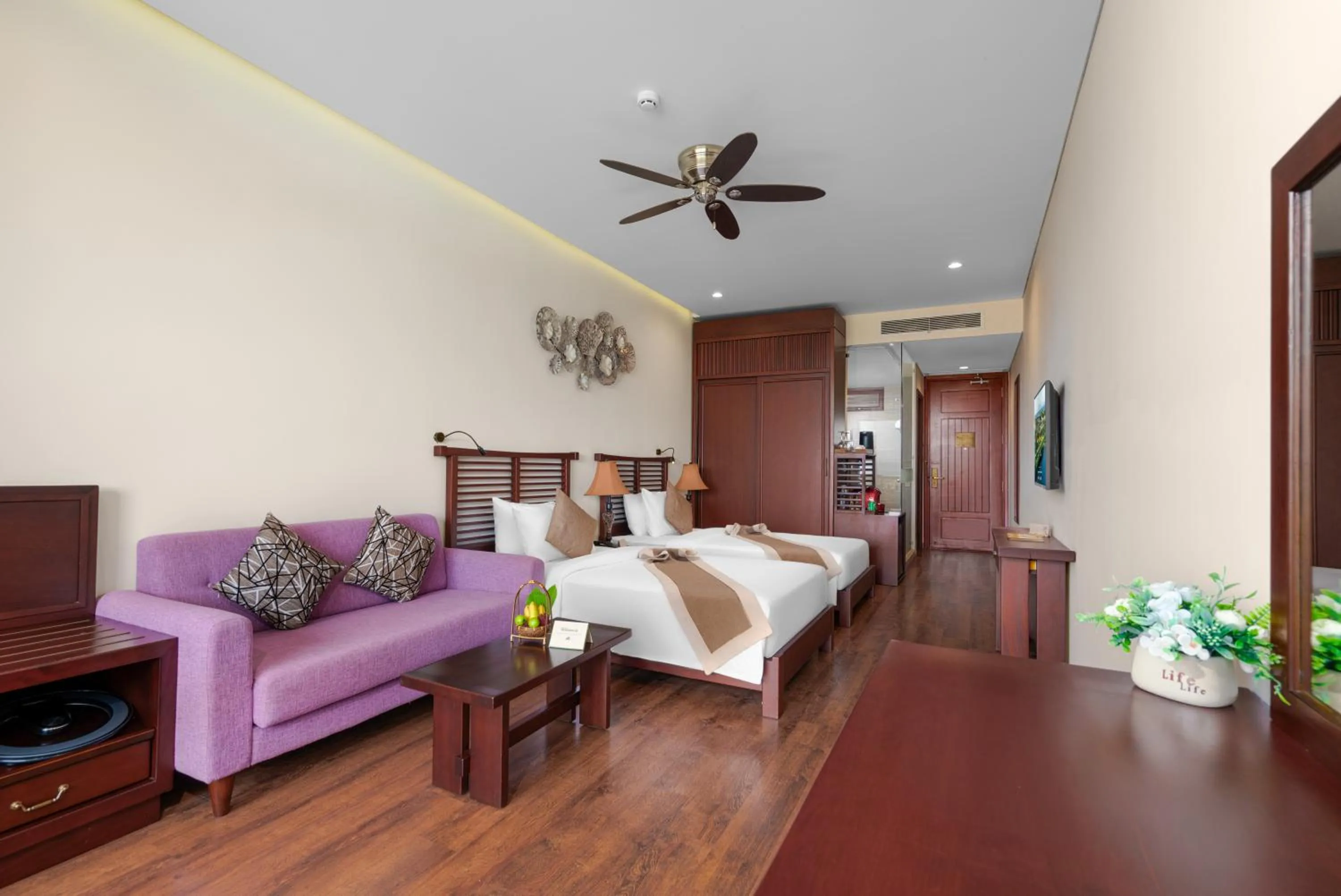 Bed in Silk Sense Hoi An River Resort - Green Luxury Escape