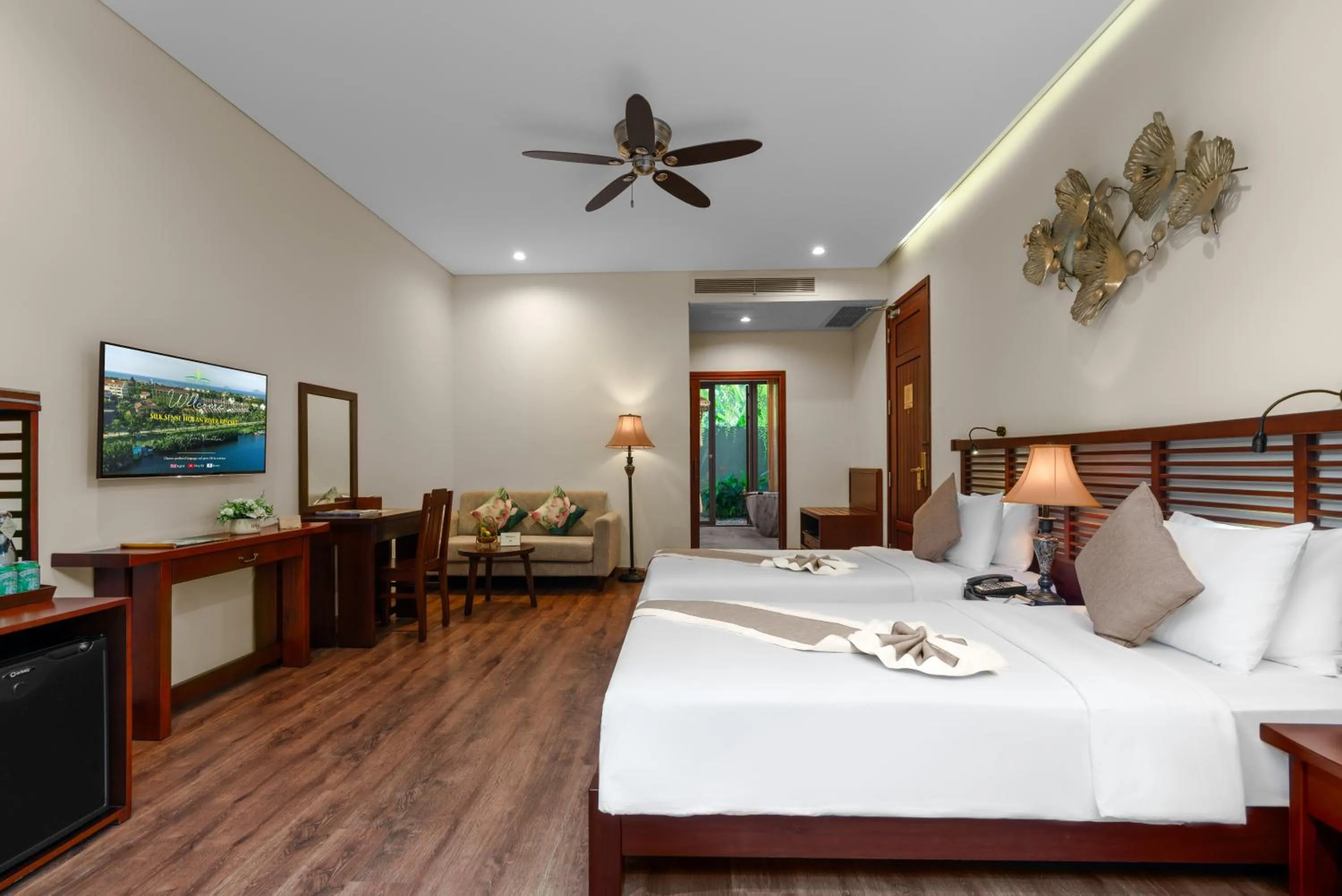 Bed in Silk Sense Hoi An River Resort - Green Luxury Escape