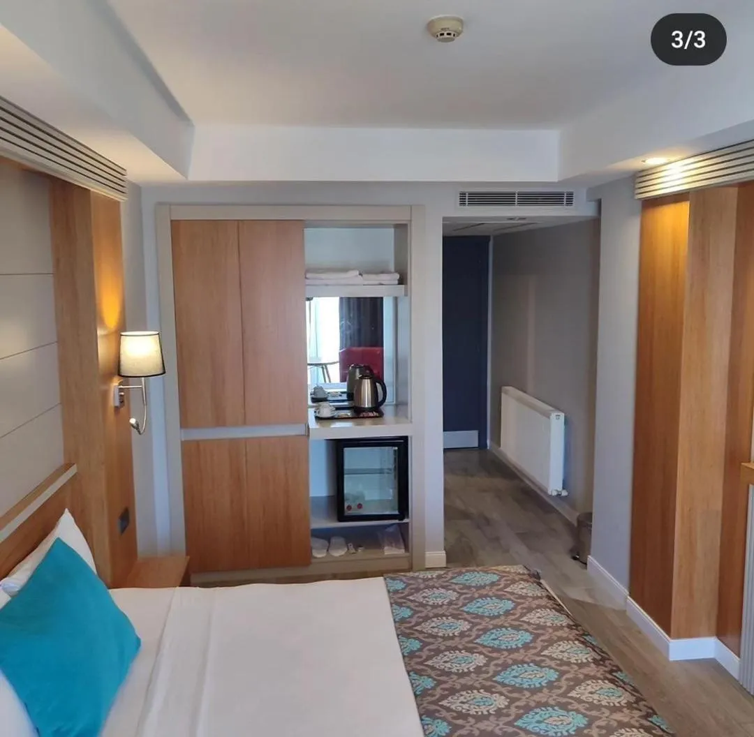 TV/Entertainment Center in SC INN Boutique Hotel