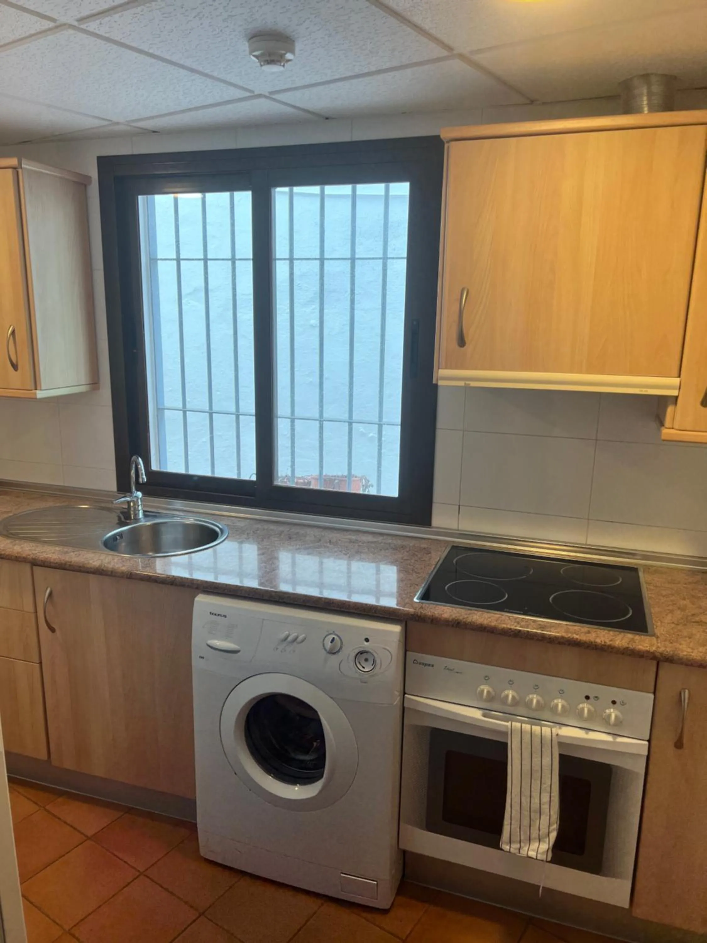 Kitchen or kitchenette in I AM La Posada Hotel and Apartment