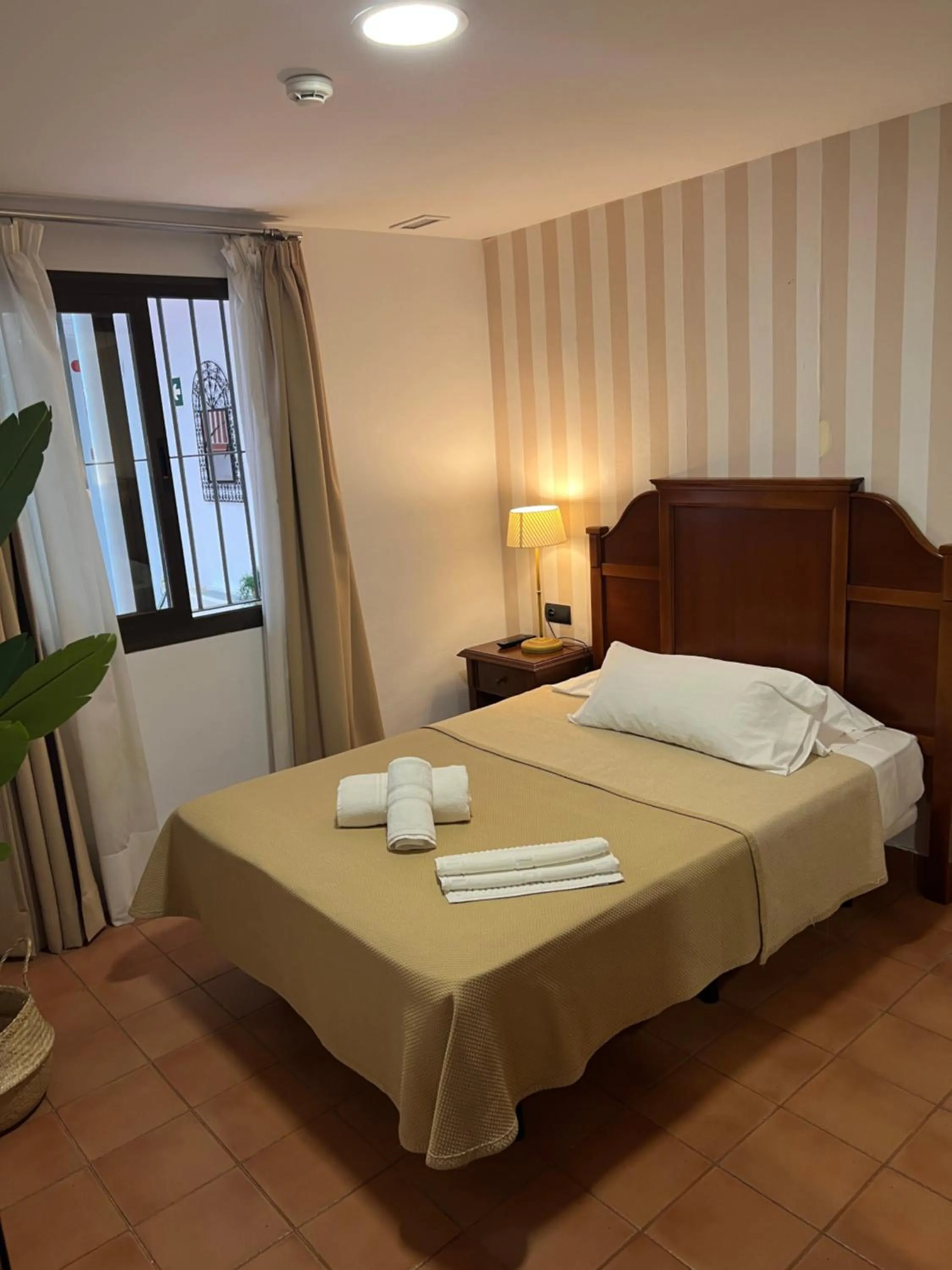 Bedroom, Bed in I AM La Posada Hotel and Apartment