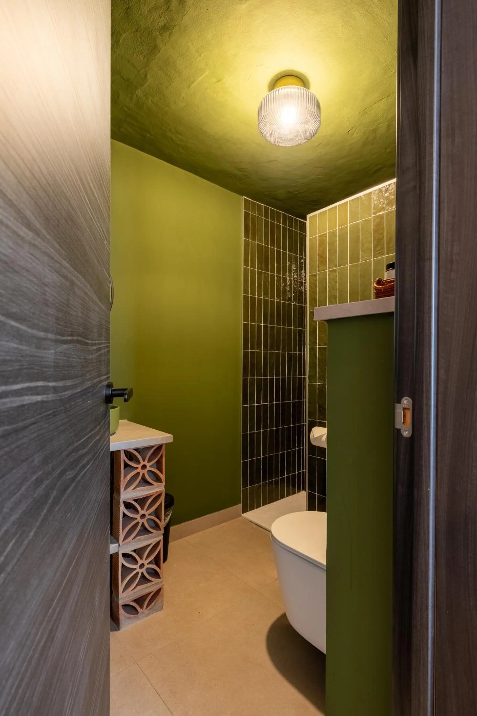 Bathroom in I AM La Posada Hotel and Apartment