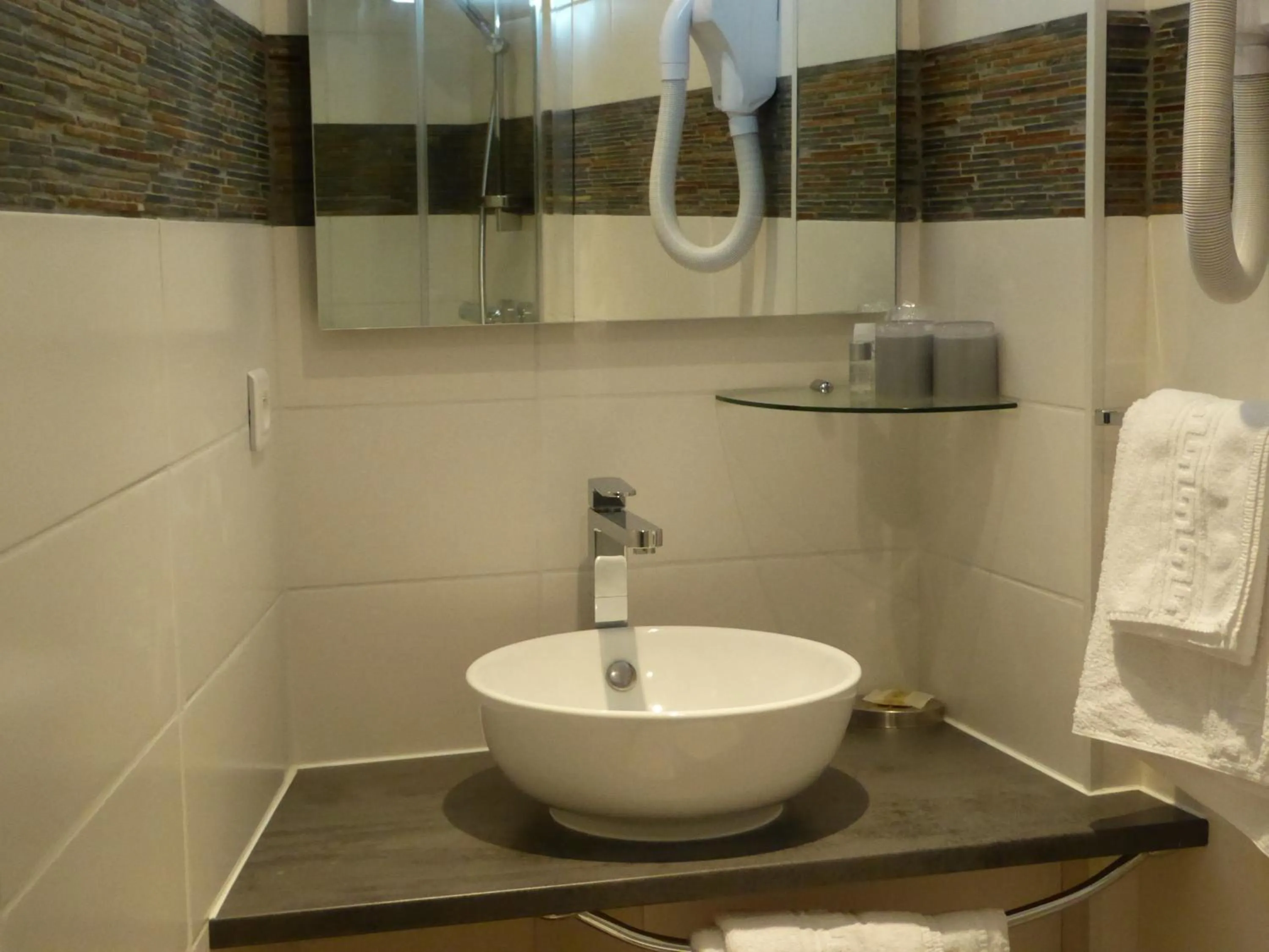 Bathroom in Logis Hôtel La Fenière