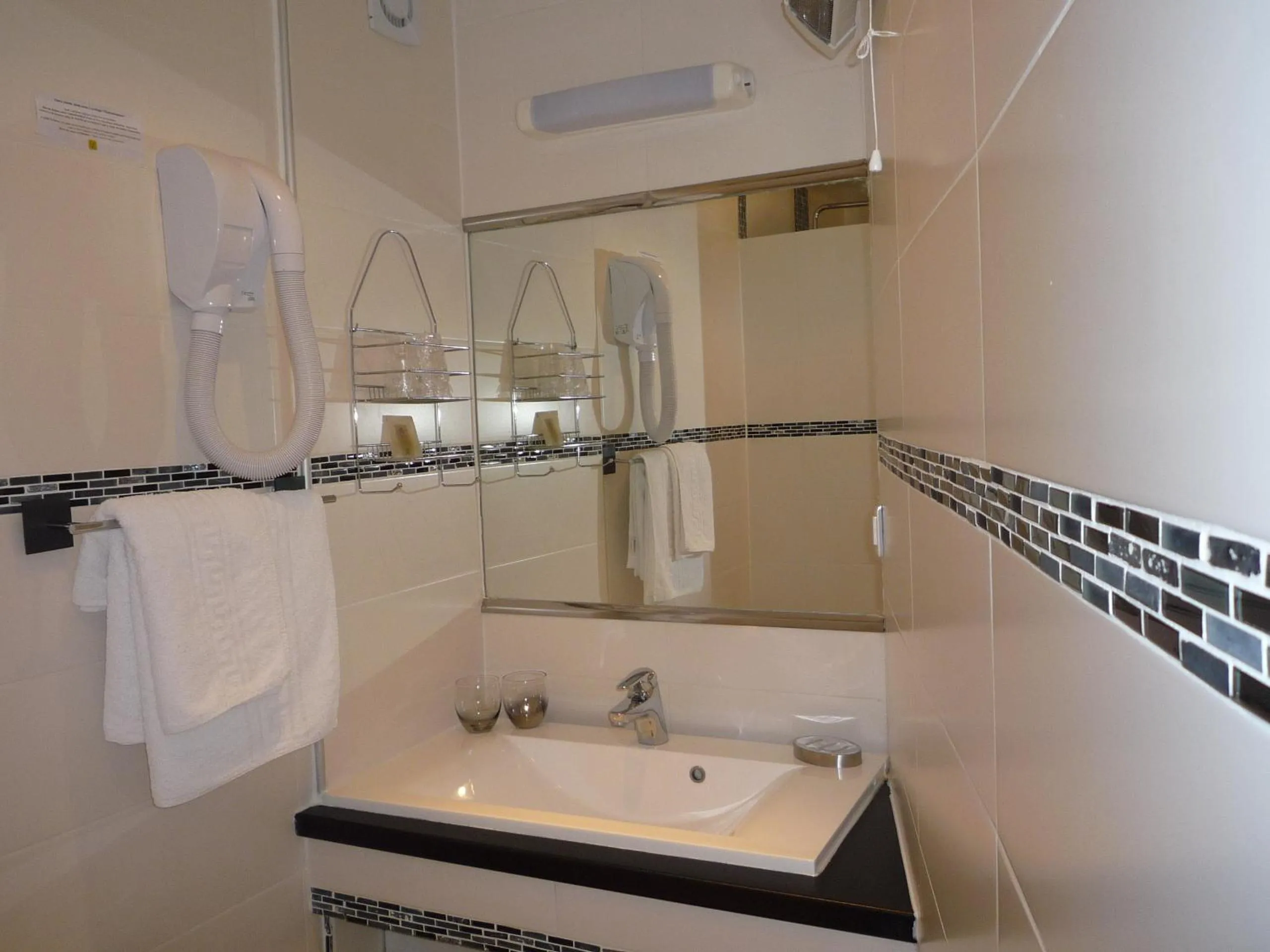 Bathroom in Logis Hôtel La Fenière