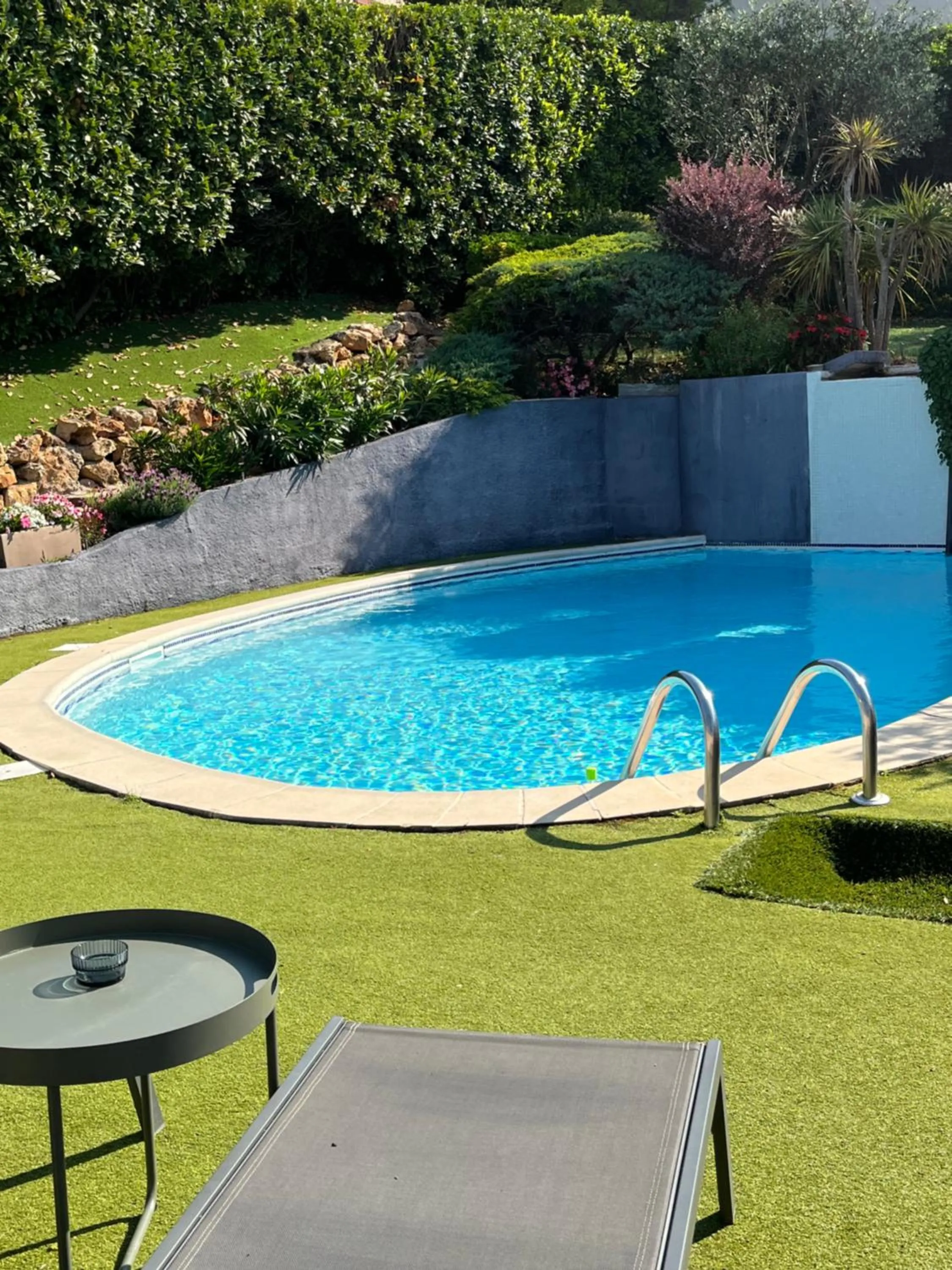 Garden in Logis Hôtel La Fenière