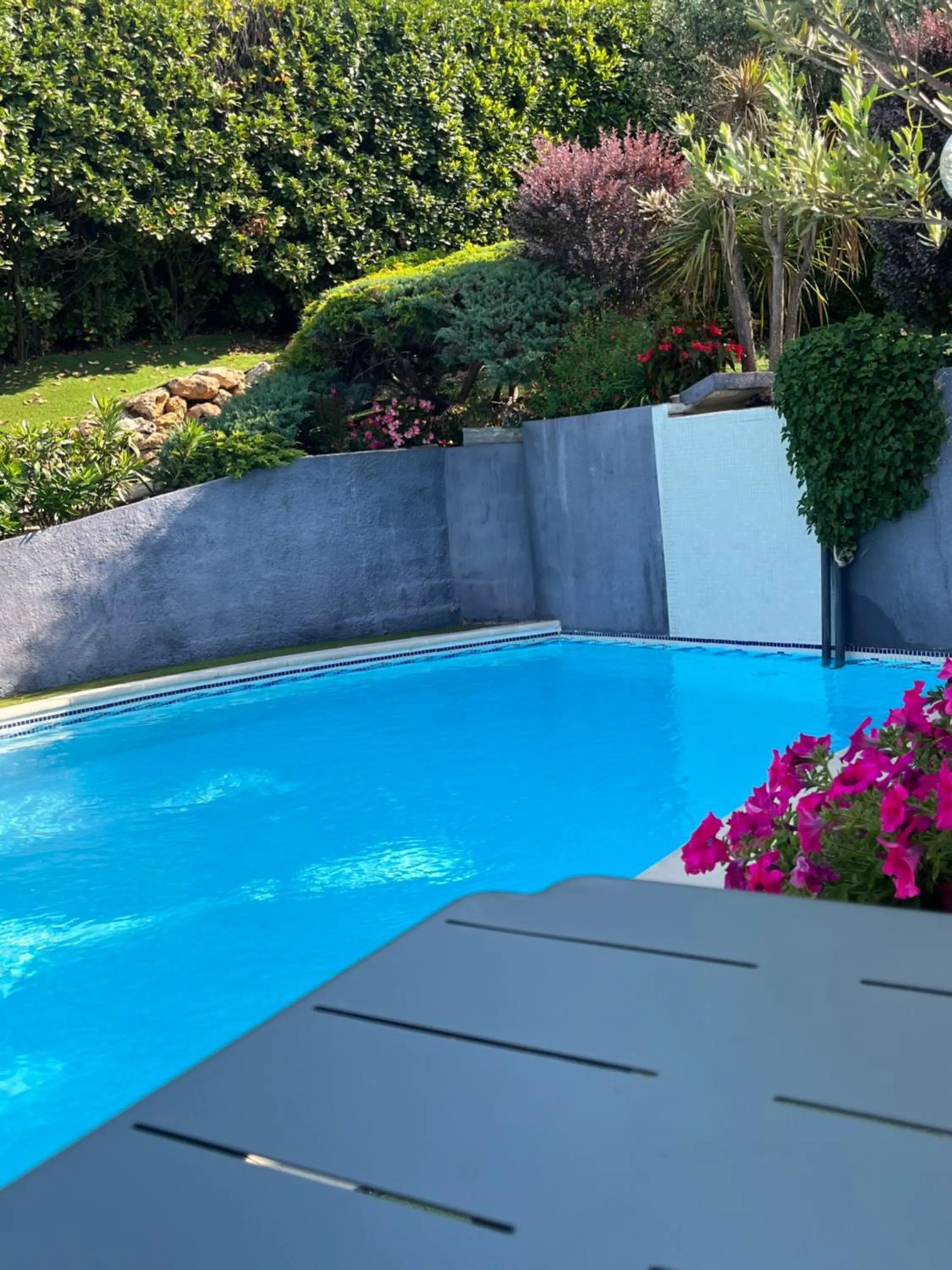 Swimming pool in Logis Hôtel La Fenière