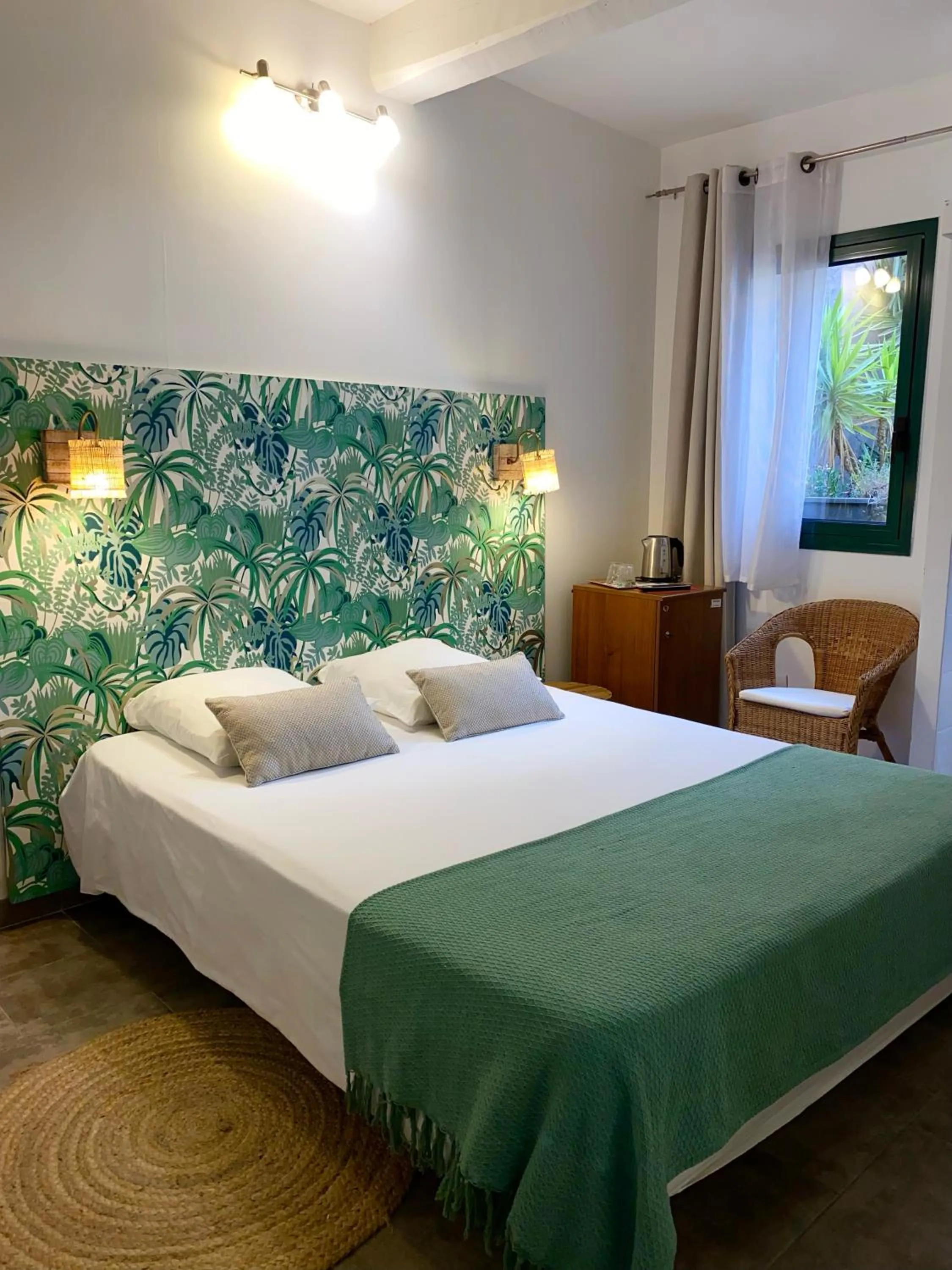 Bed in Logis Hôtel La Fenière