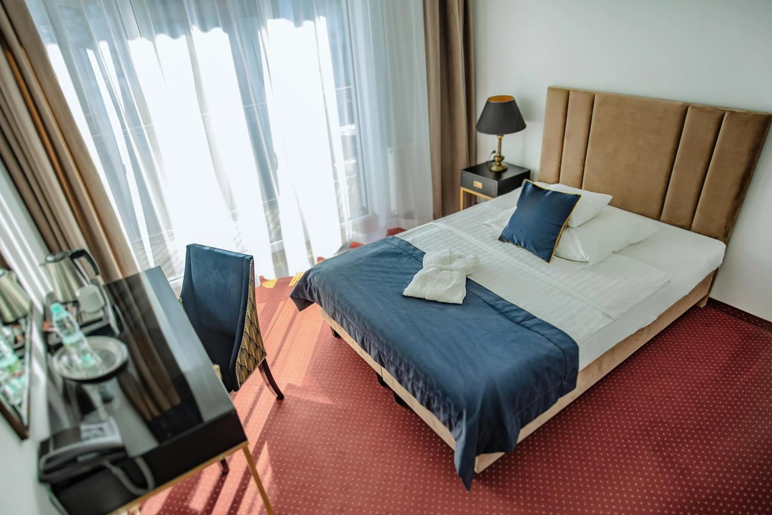 Bed in Prawdzic Family Resort & Wellness