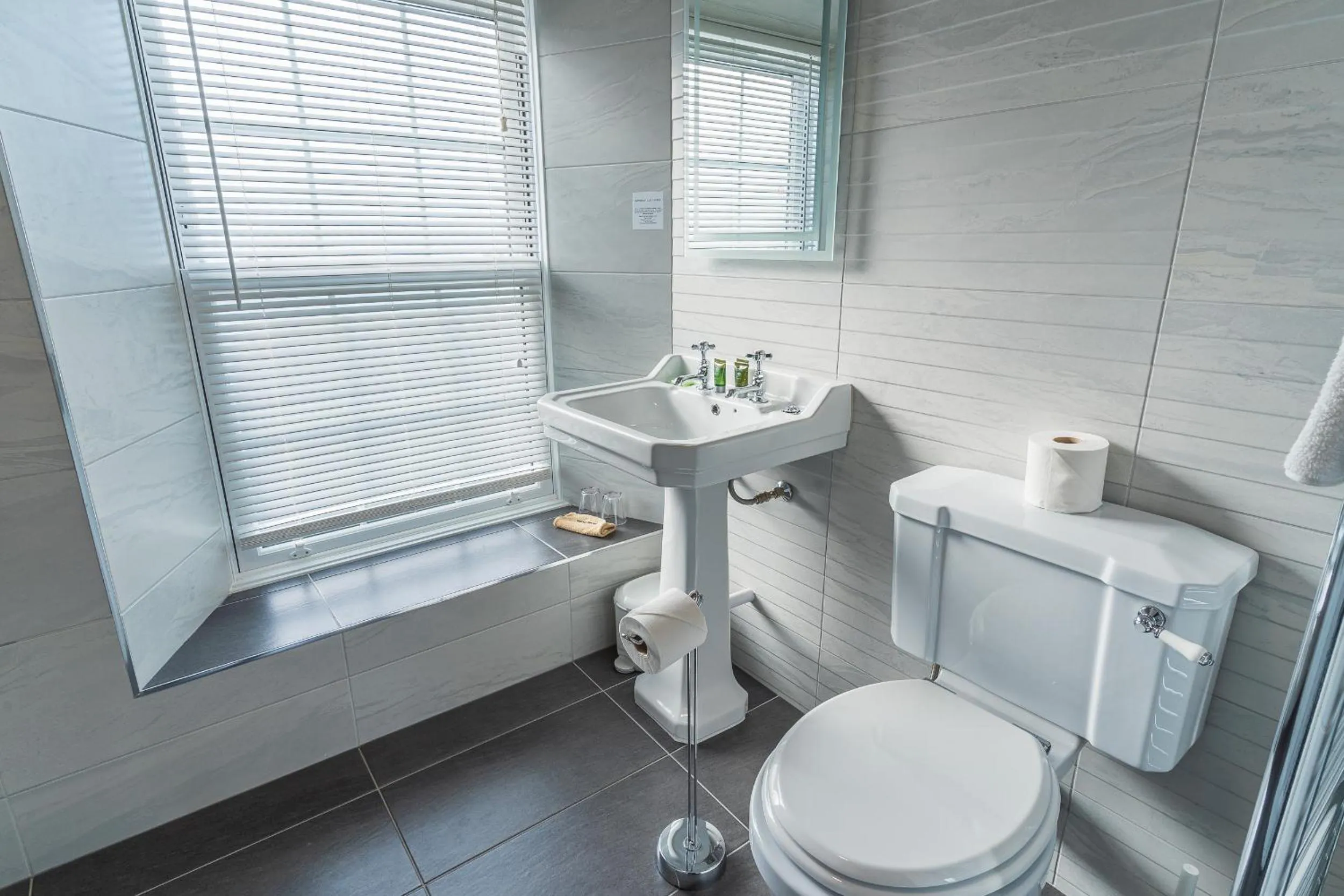 Toilet in Rooms at The Highcliffe