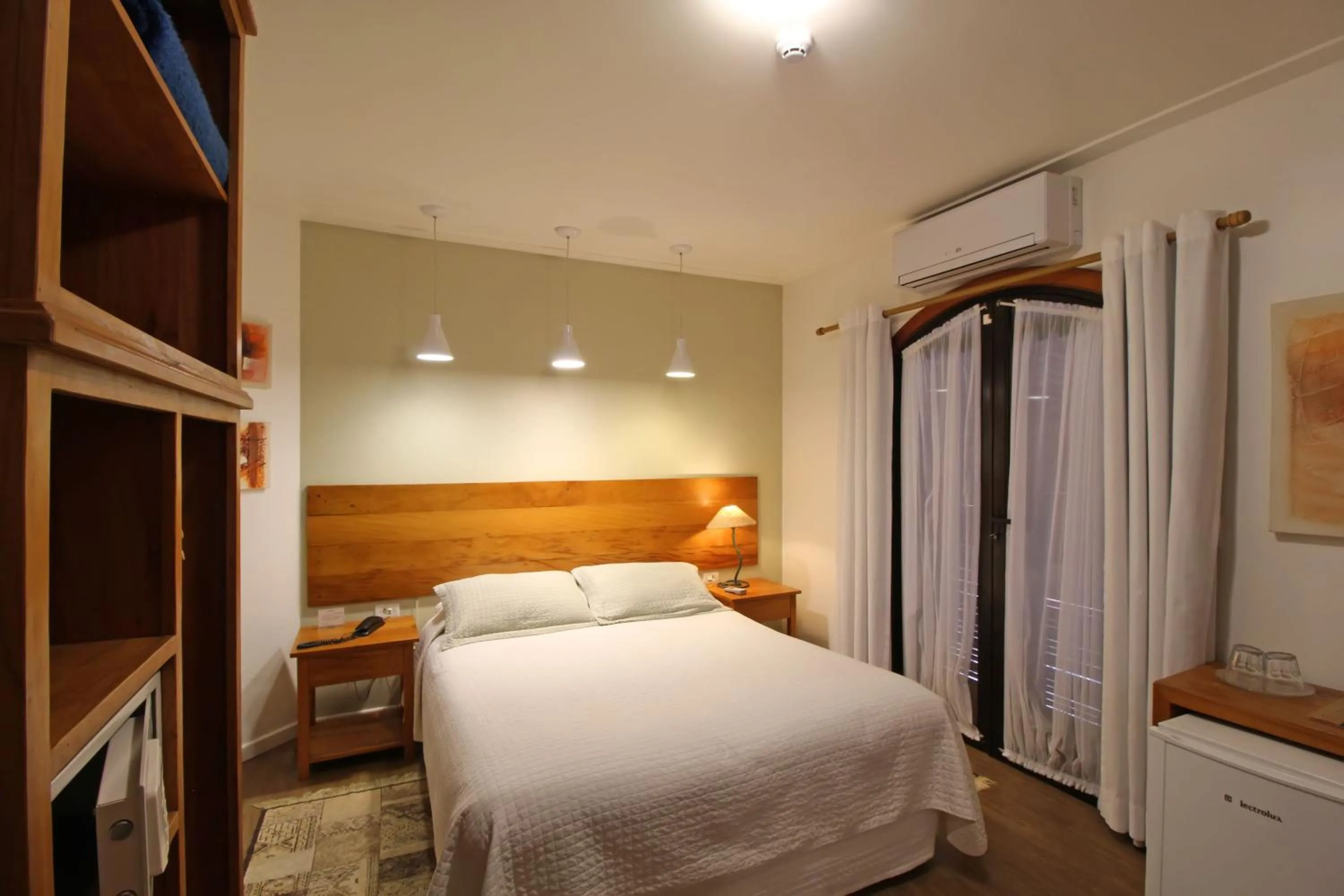 Bed in Pousada Villa Capivary Campos do Jordão