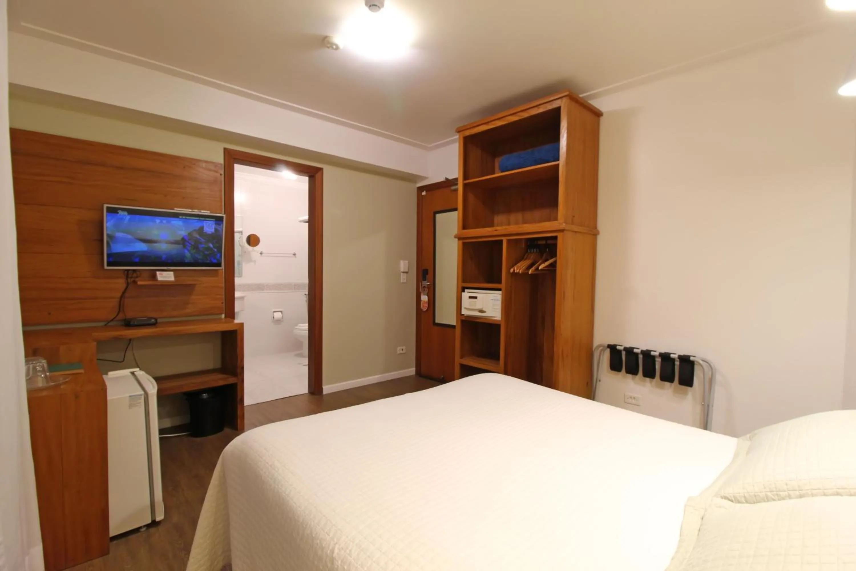 Bed in Pousada Villa Capivary Campos do Jordão