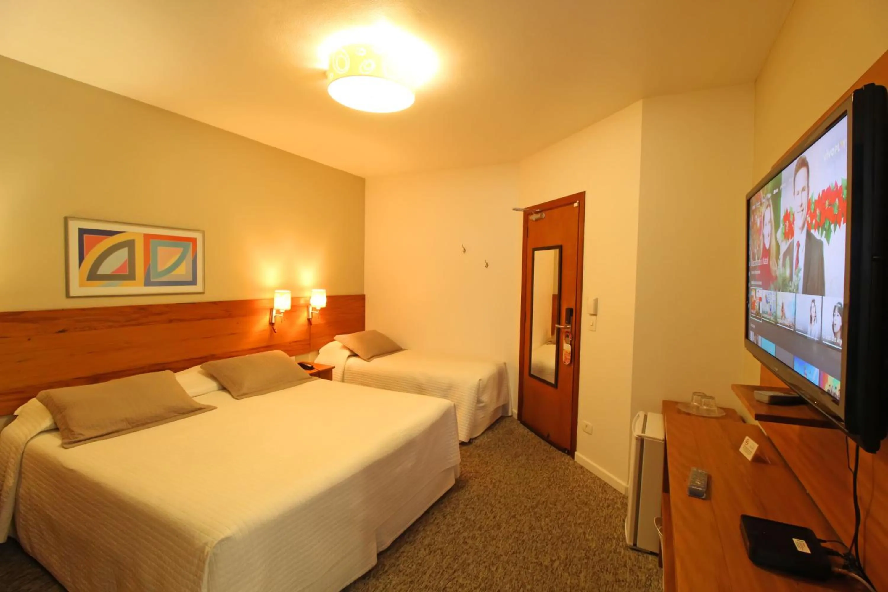 Bed in Pousada Villa Capivary Campos do Jordão