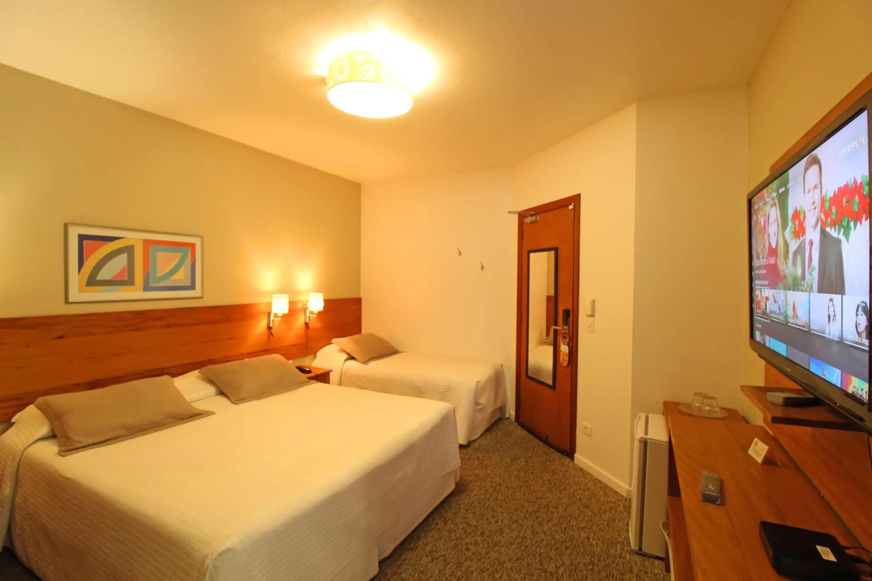 Bed in Pousada Villa Capivary Campos do Jordão