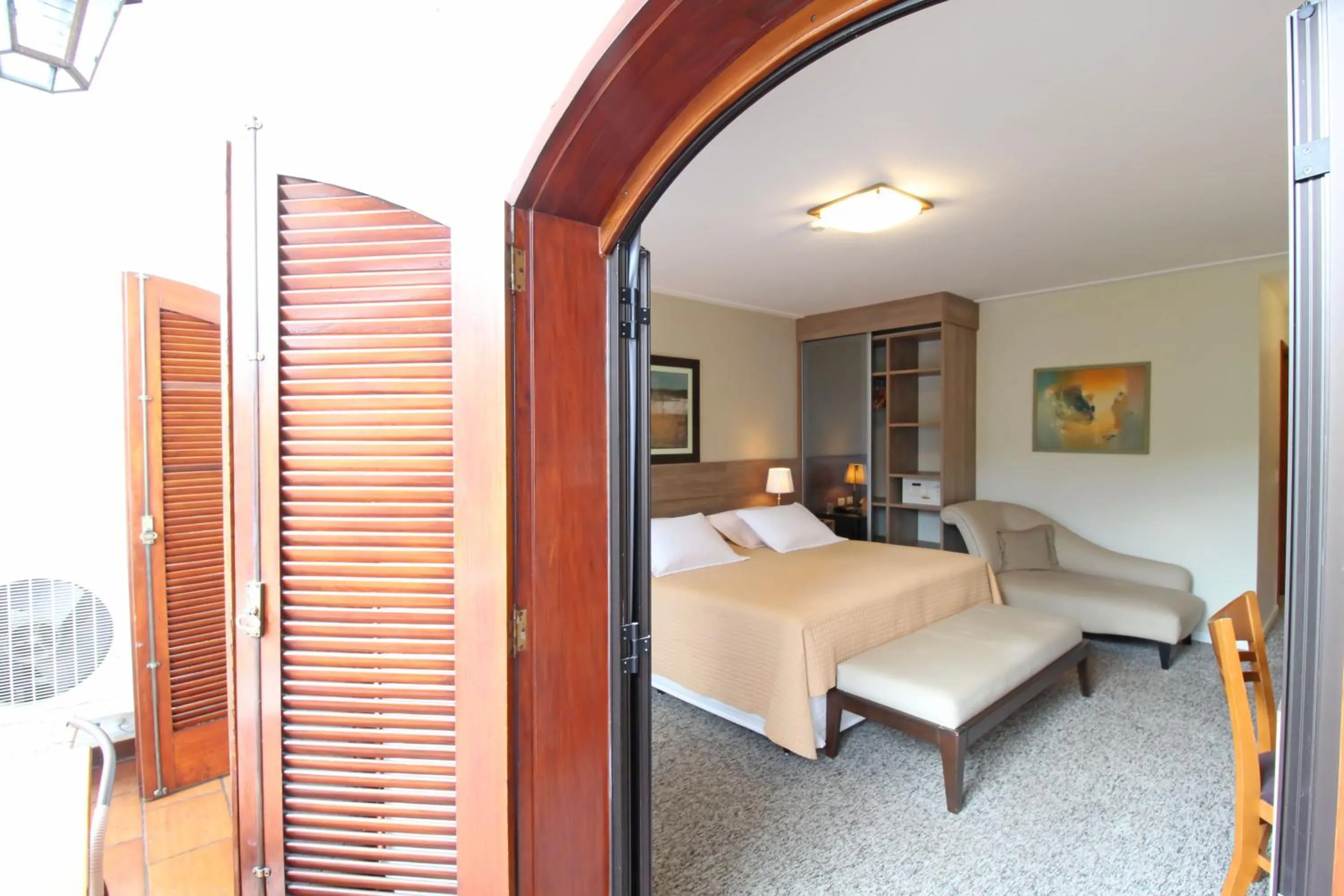 Balcony/Terrace, Bed in Pousada Villa Capivary Campos do Jordão