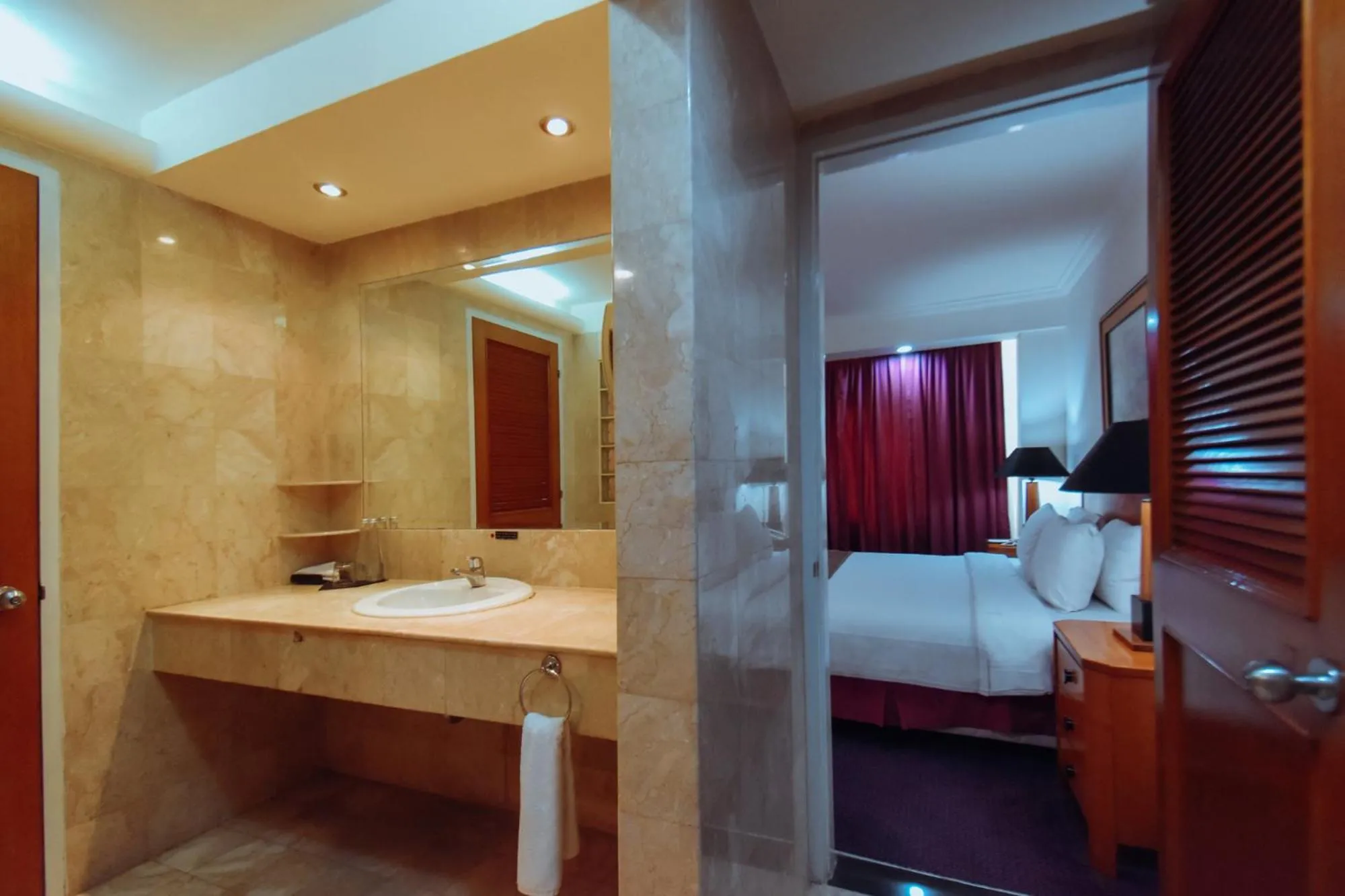 Bathroom, Bed in Surabaya Suites Hotel Powered by Archipelago
