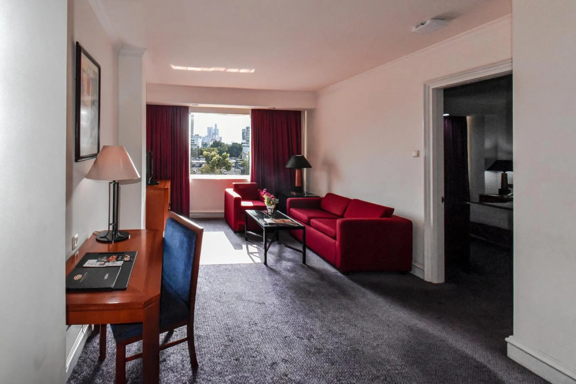 Seating area in Surabaya Suites Hotel Powered by Archipelago