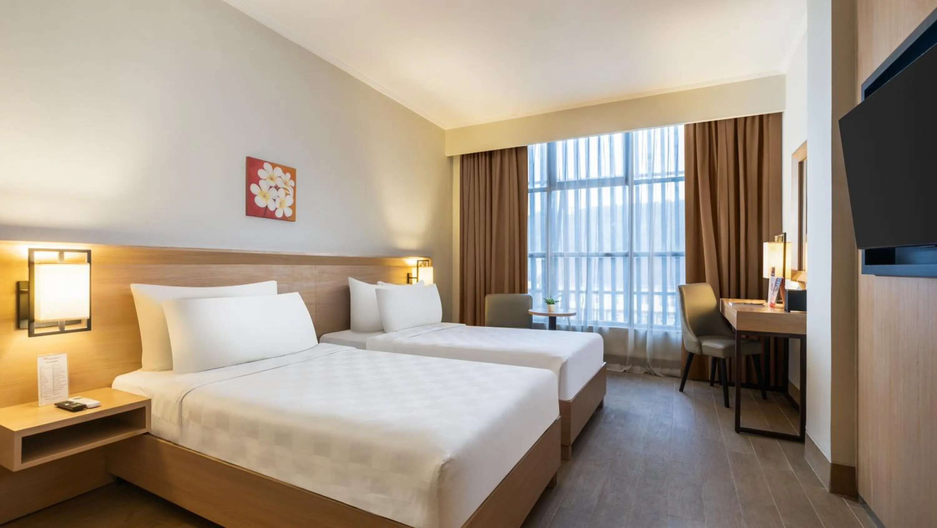 Bed in Swiss-Belhotel Manokwari