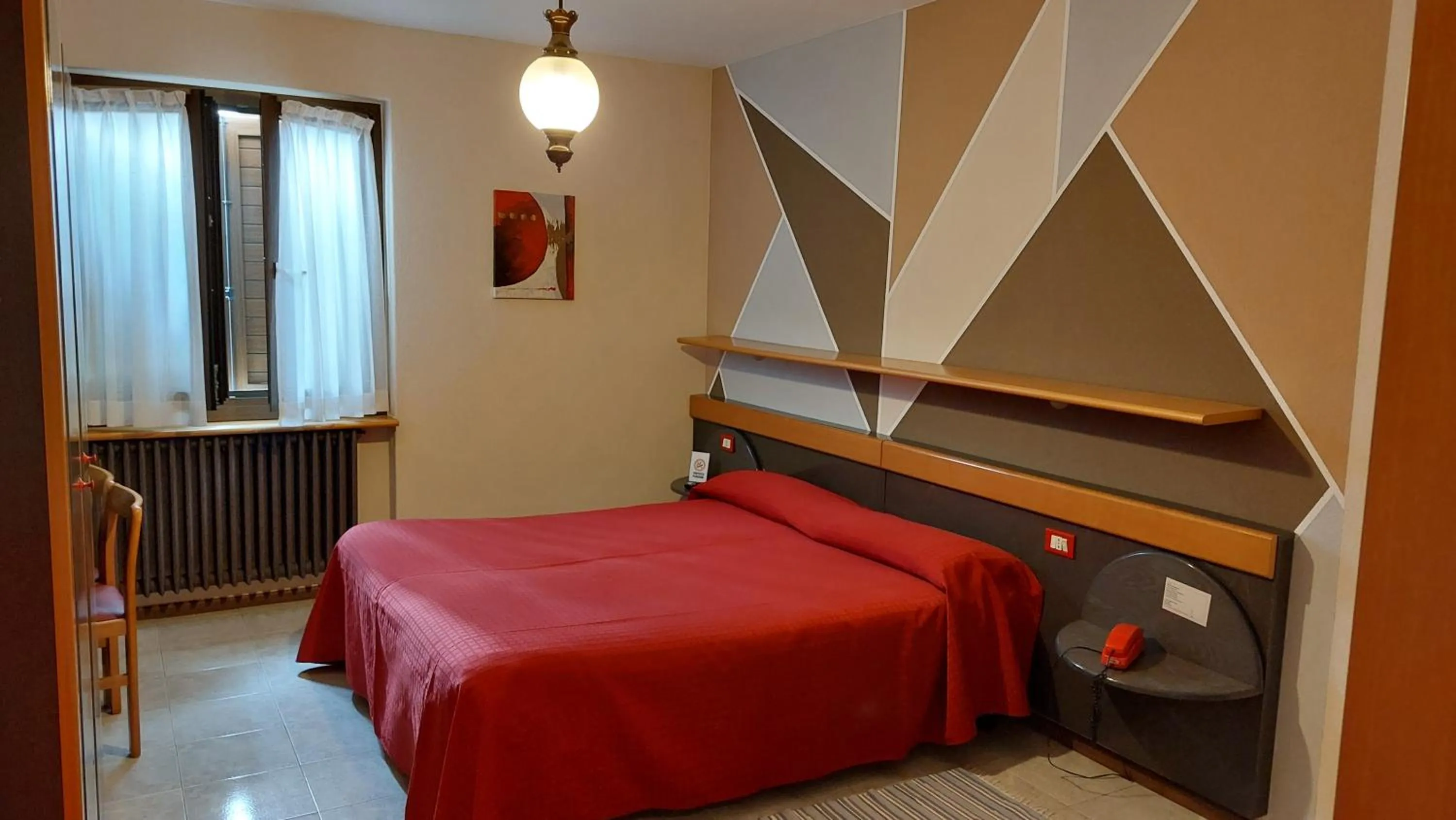 Bed in Hotel La Lanterna