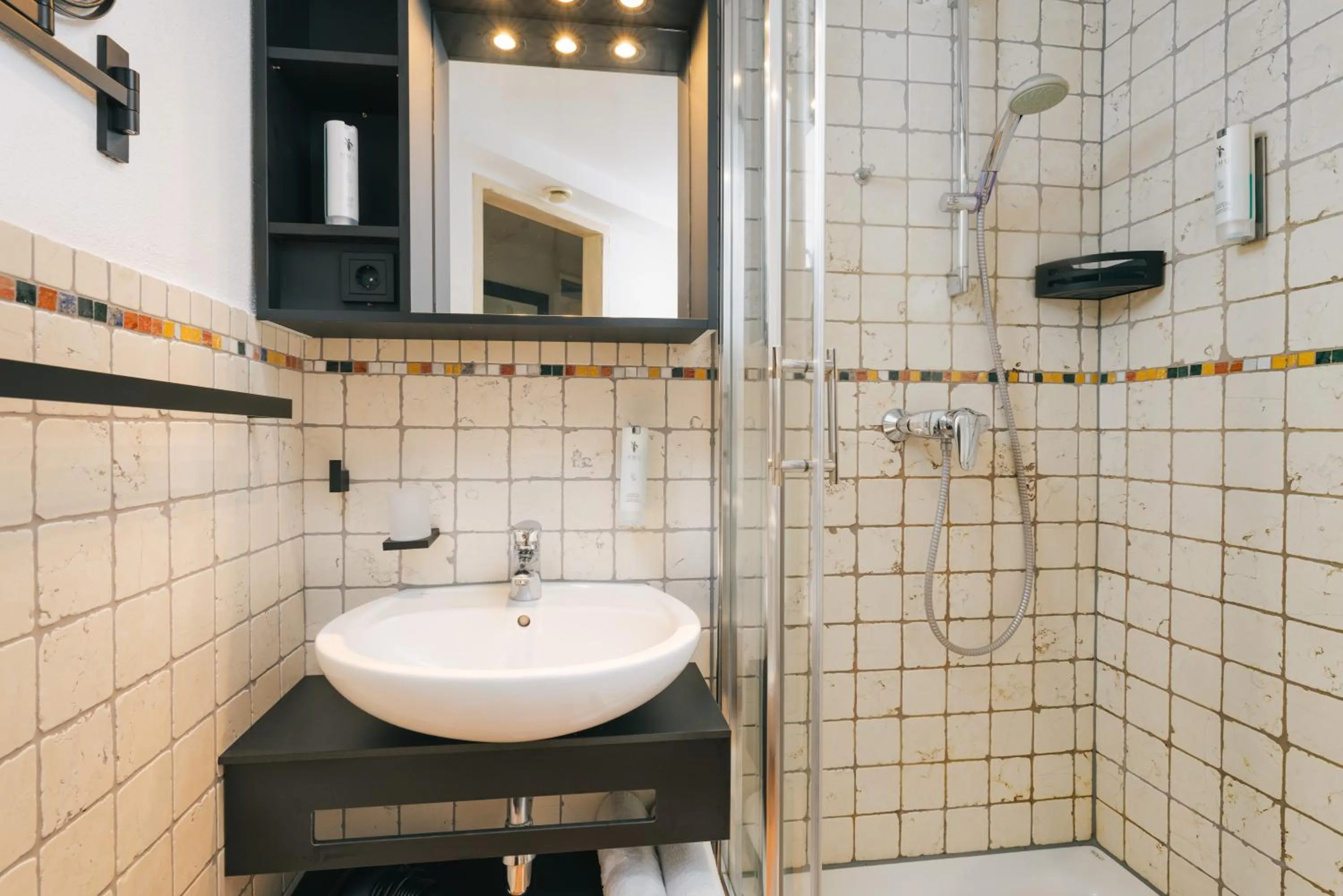 Bathroom in MONDI Hotel Axams