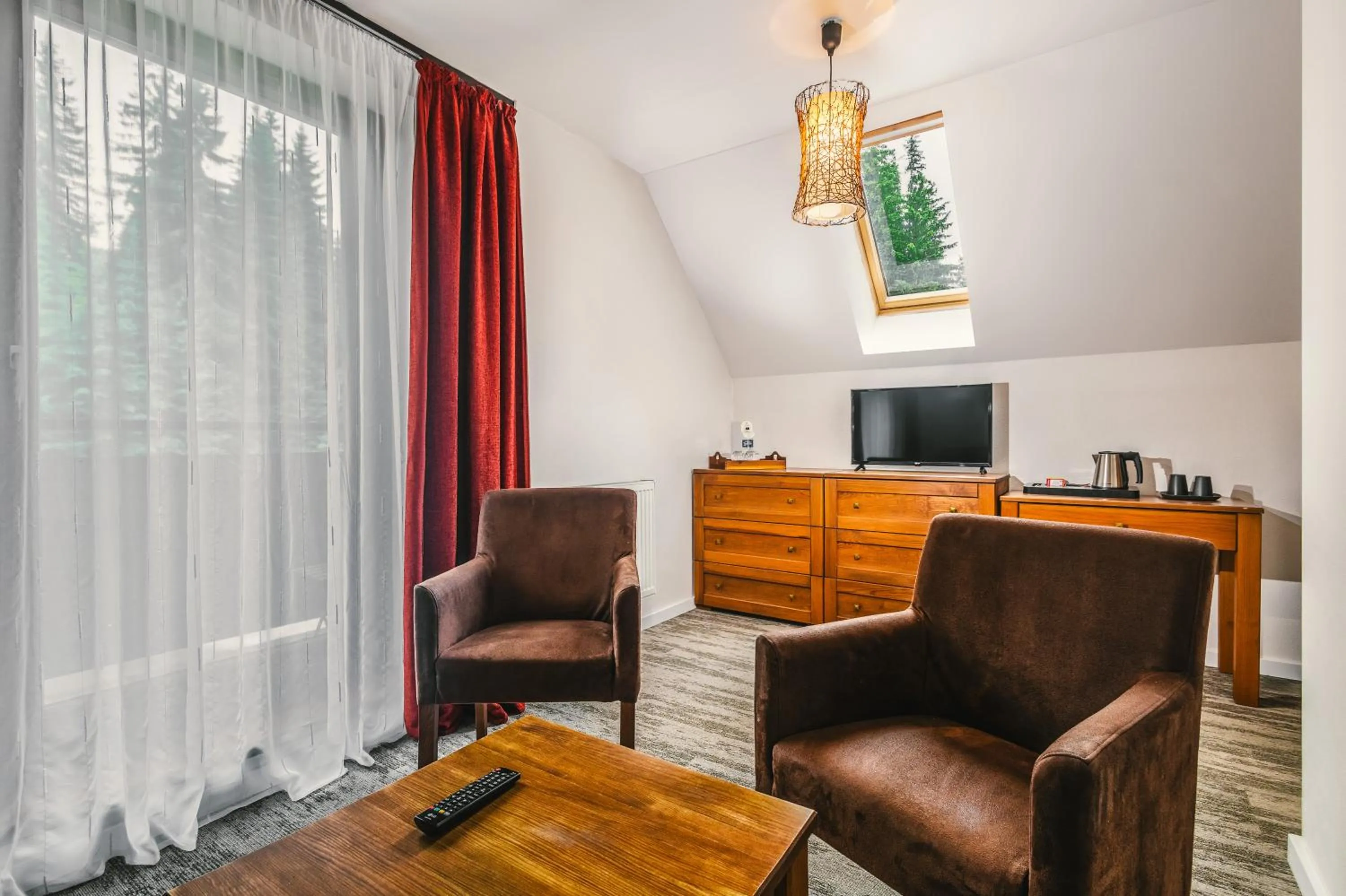 Communal lounge/ TV room in Hotel Mikulášska Chata