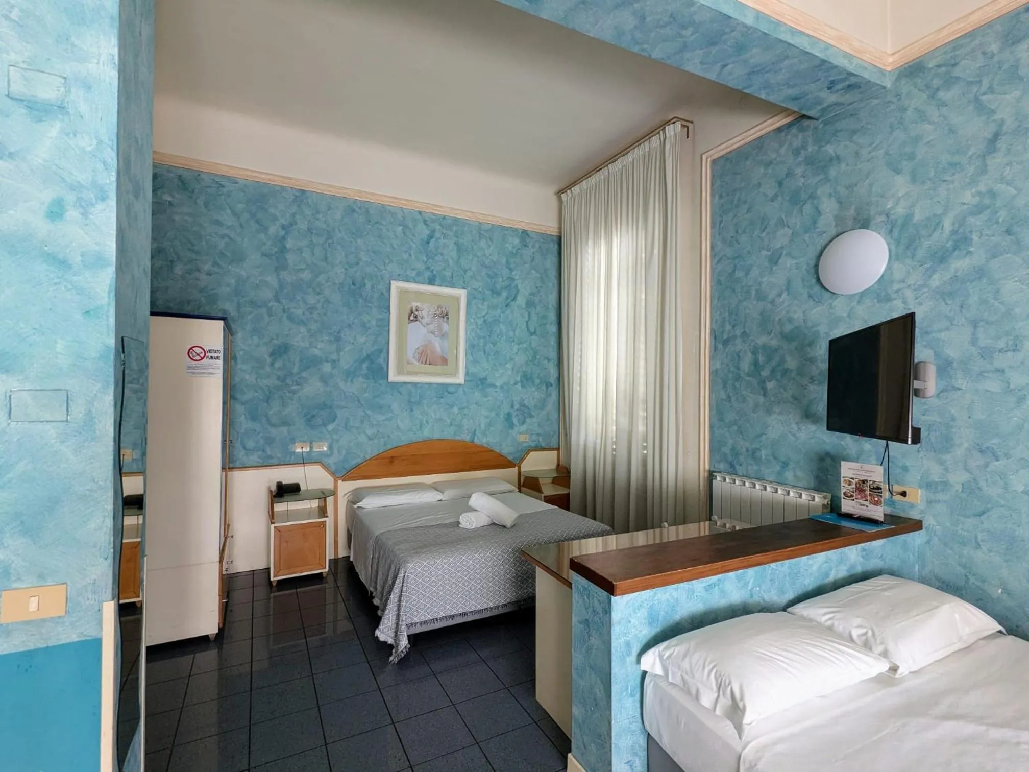 Bed in Hotel Soggiorno Athena