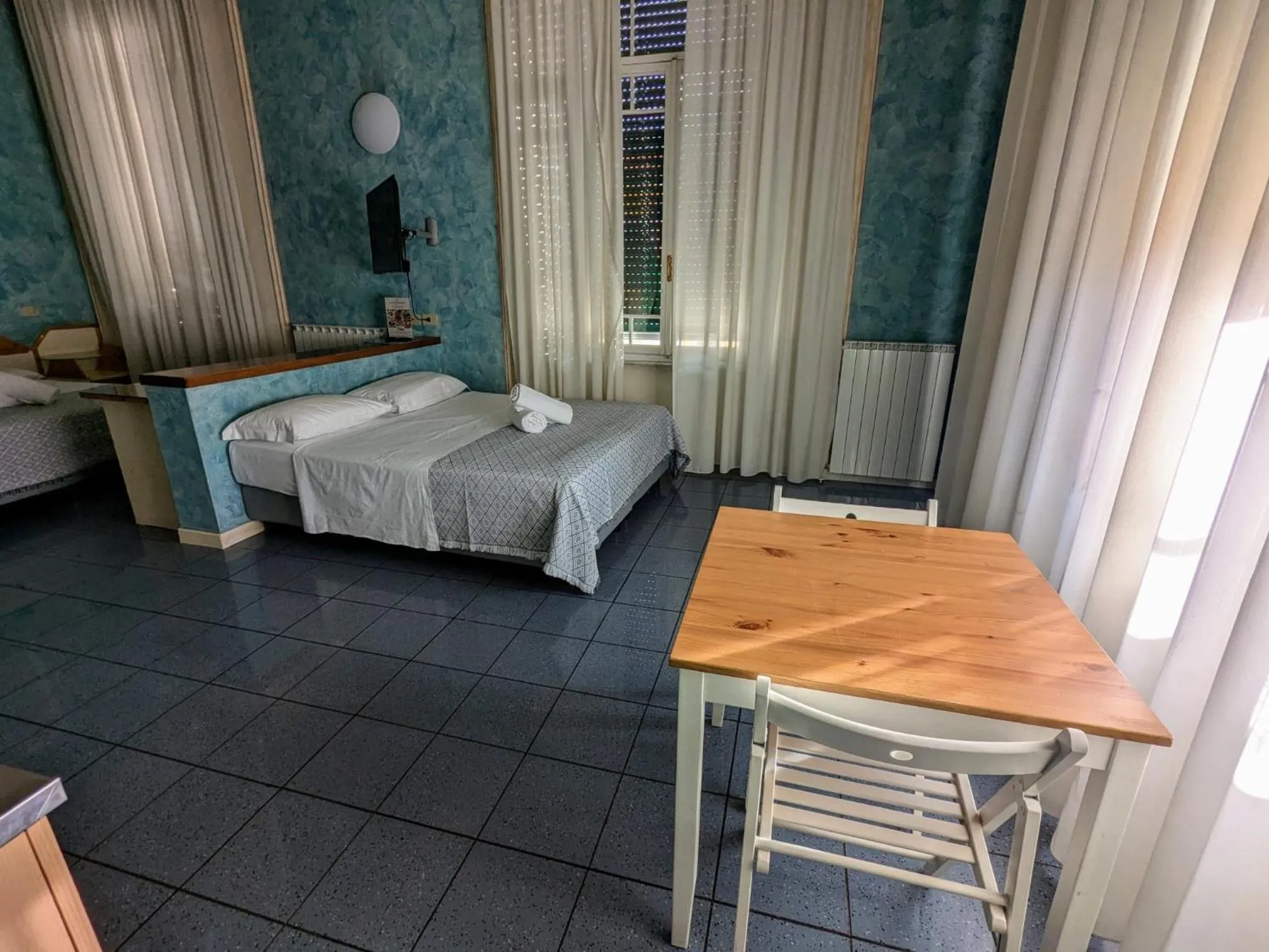 Bed in Hotel Soggiorno Athena