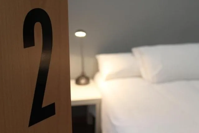 Decorative detail, Bed in Hostal Nitzs Bcn