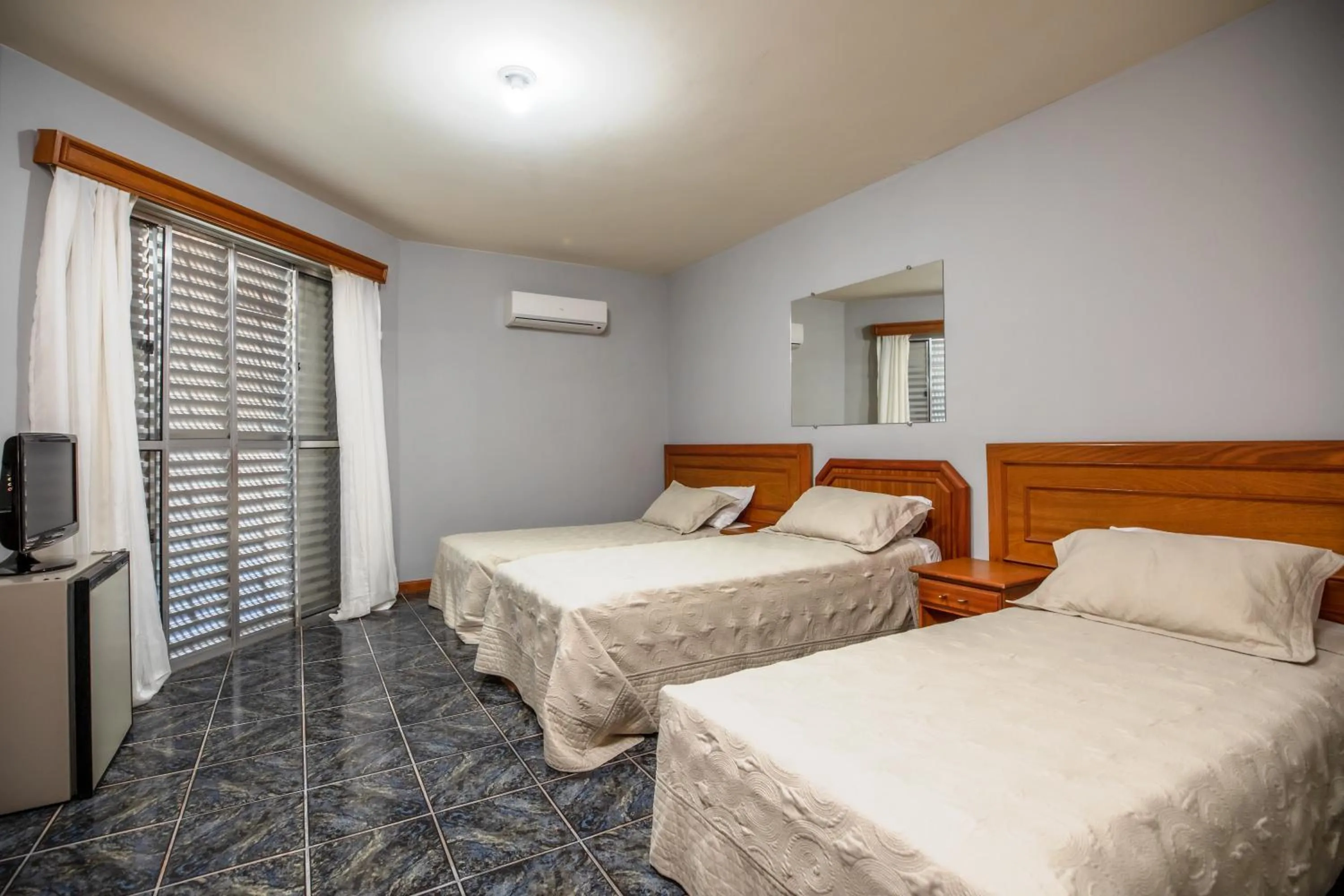 Bed in Canzi Cataratas Hotel